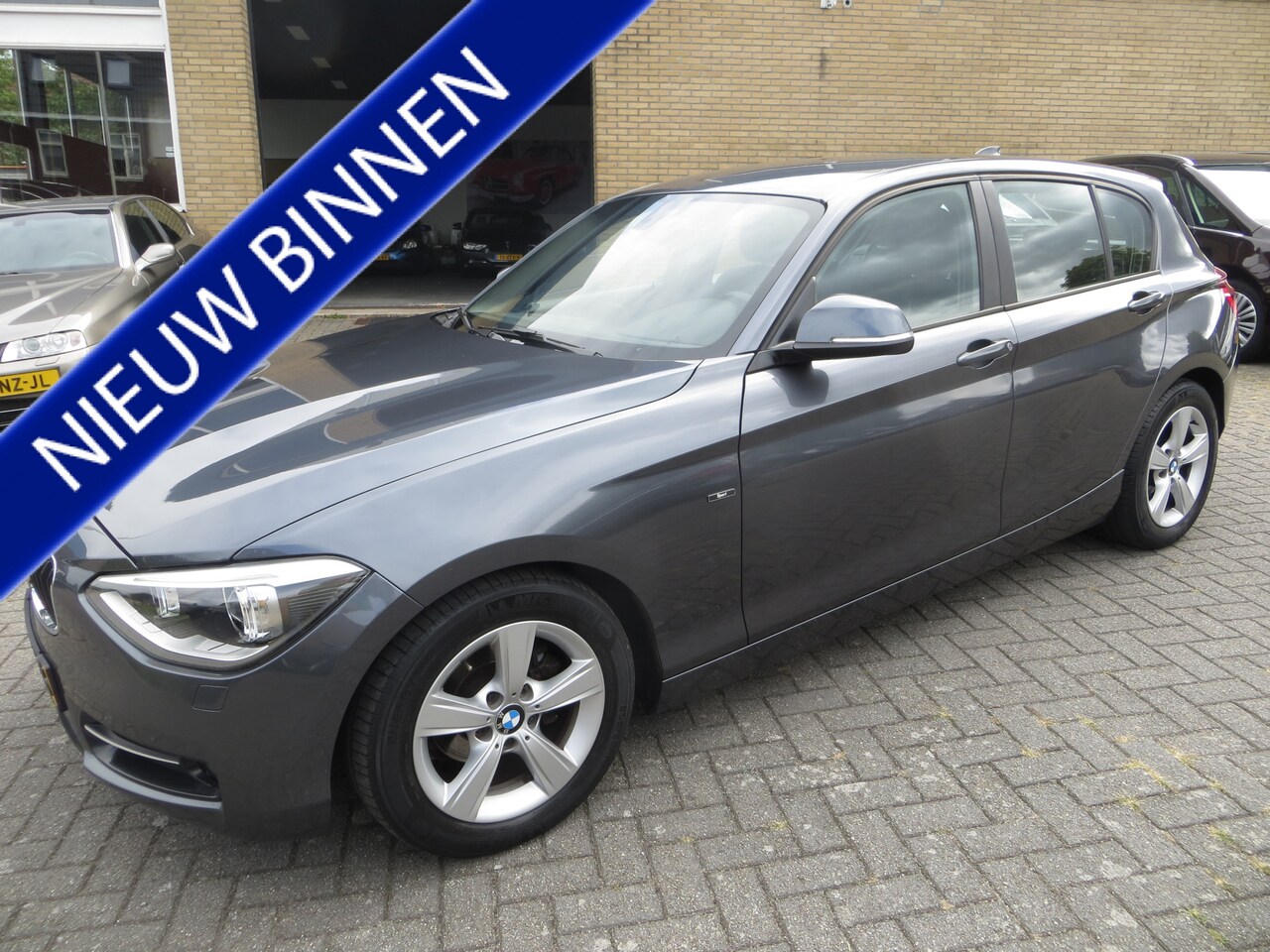 BMW 1-serie - 116i EDE Business Exec. NAVI-NAP-NEDERL.-ZEER NETJES! - AutoWereld.nl