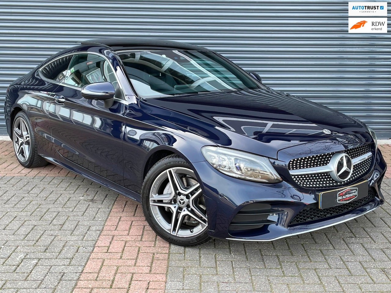 Mercedes-Benz C-klasse Coupé - 180 Pano | AMG Pakket | Leder | Camera | Sfeerverlichting - AutoWereld.nl