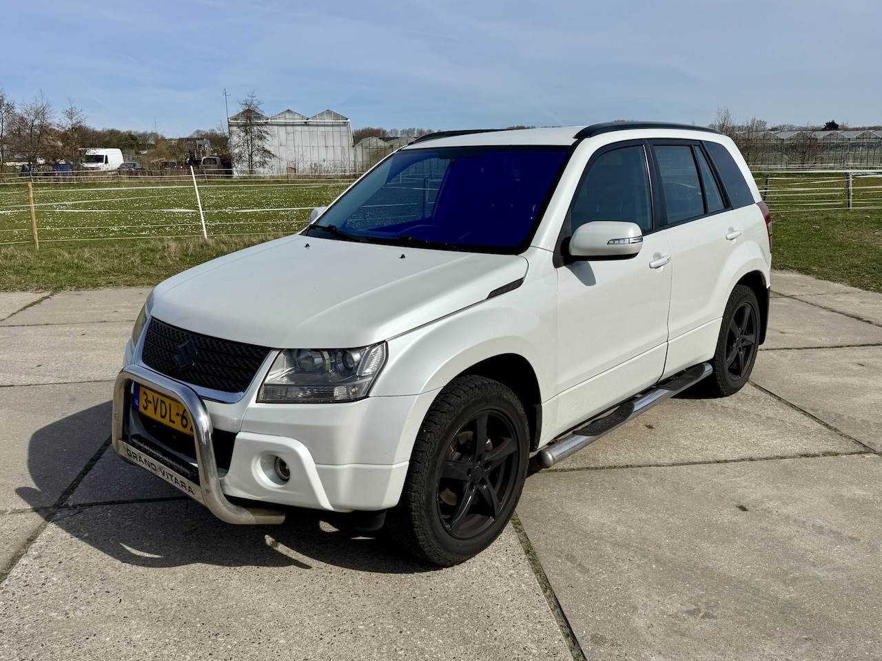 Suzuki Grand Vitara - 1.9 4x4 airco leder cruise control trekhaak - AutoWereld.nl