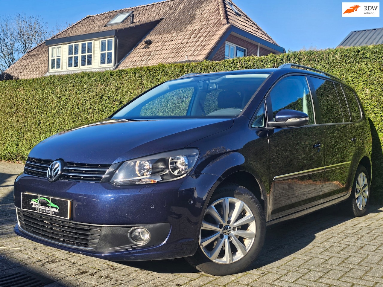 Volkswagen Touran - 1.6 TDI Highline BlueMotion 7p. 1.6 TDI Highline BlueMotion 7p. - AutoWereld.nl