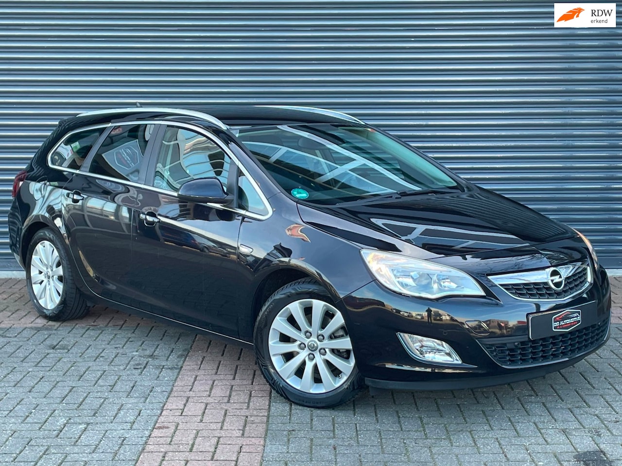 Opel Astra Sports Tourer - 1.6 Turbo Cosmo Navi | Stoelverw | Cruise | 179 PK - AutoWereld.nl