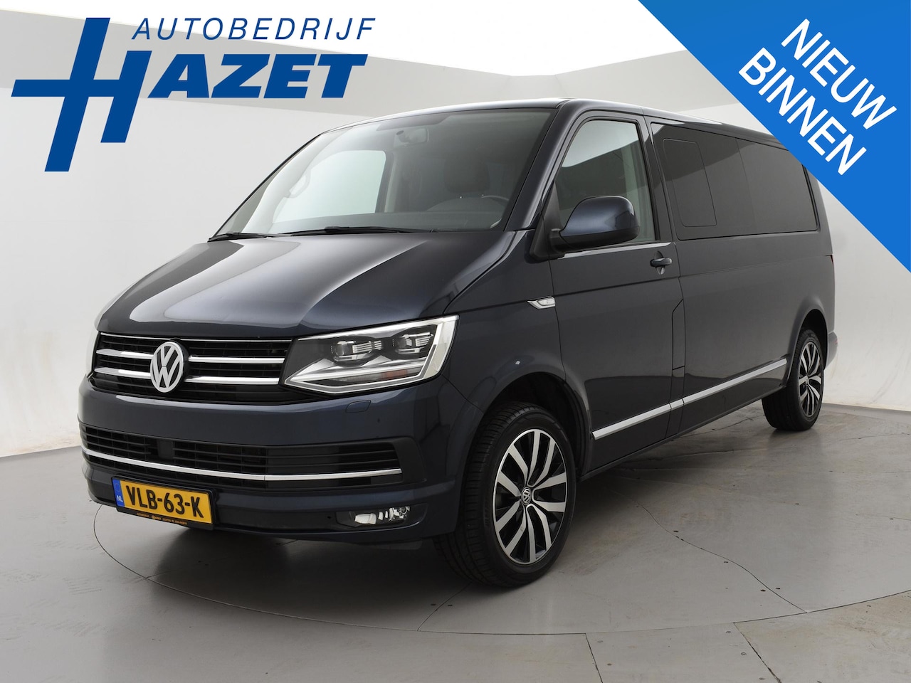 Volkswagen Transporter Caravelle - 2.0 TDI 204 PK DSG DUBBEL CABINE + CAMERA | CARPLAY | LEDER | 18 INCH | LED | STOELVERWARM - AutoWereld.nl