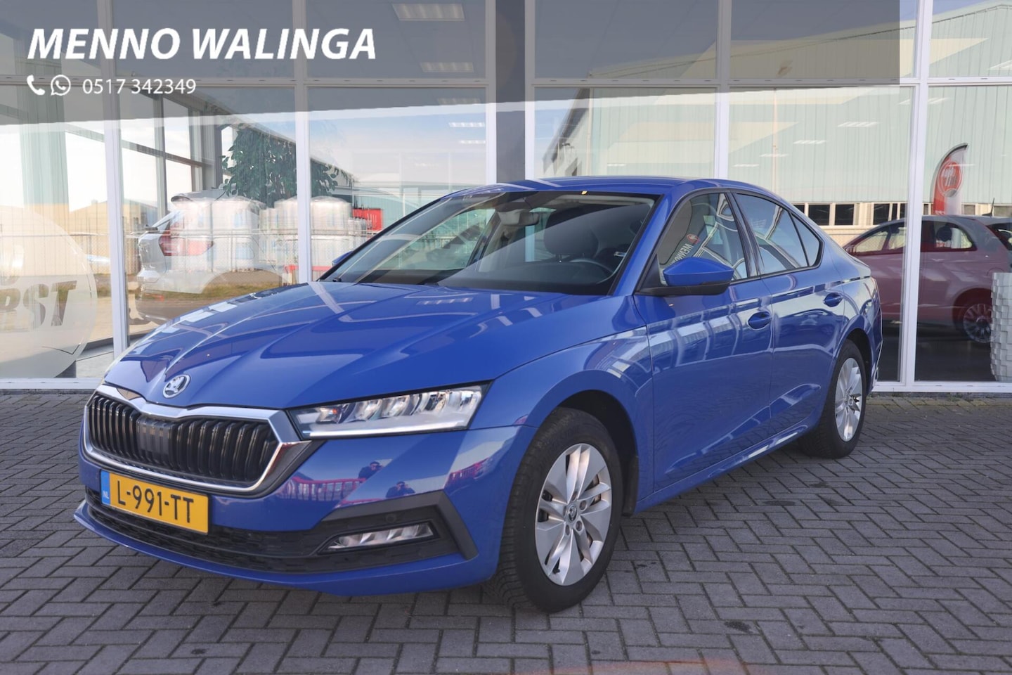 Skoda Octavia - 1.0 e-TSI Business Edition|Cruise|Navi|PDC|Led|Virtual| - AutoWereld.nl
