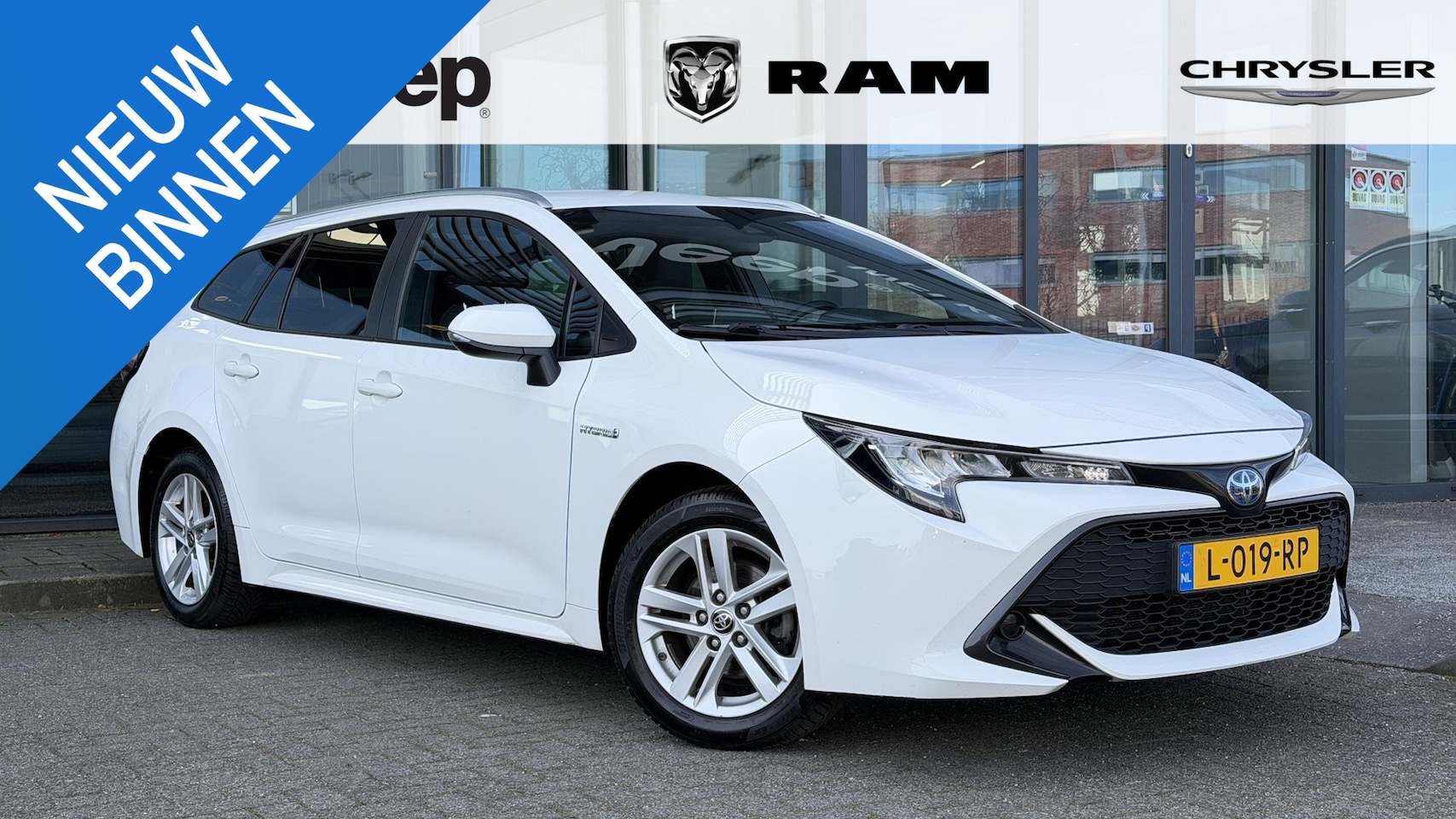 Toyota Corolla Touring Sports - 1.8 Hybrid Business | NAP | - AutoWereld.nl