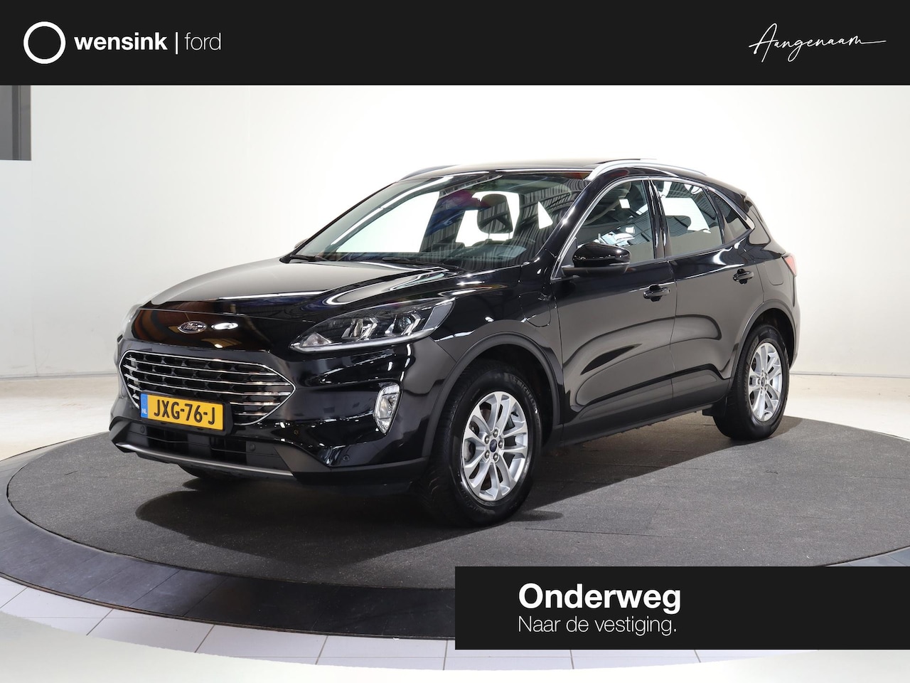 Ford Kuga - 2.5 PHEV Titanium | Trekhaak | Panoramadak | Winterpakket | Navigatie | Parkeercamera | - AutoWereld.nl
