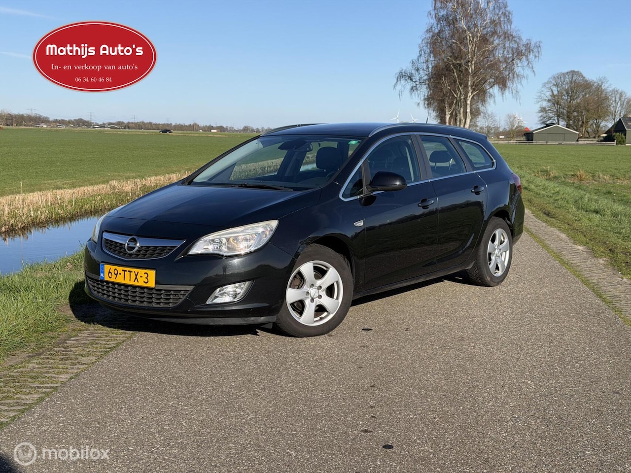 Opel Astra Sports Tourer - 1.4 Turbo Business + schade! - AutoWereld.nl