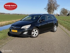 Opel Astra Sports Tourer - 1.4 Turbo Business + schade