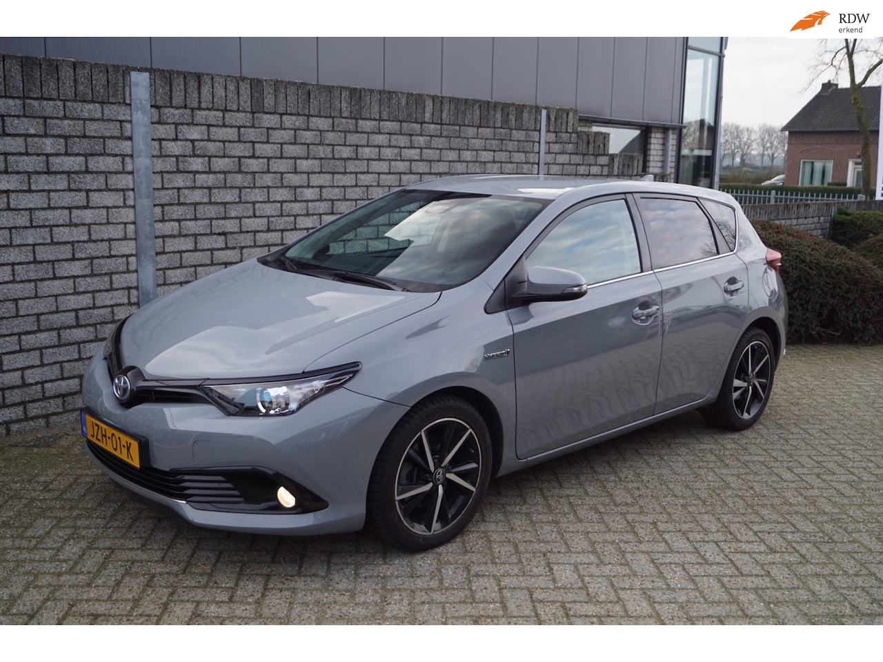 Toyota Auris - 1.8 Hybrid Aspiration Autom Navi Camera Clima Sportst Cruise Botswaarschuwing Rijstrook As - AutoWereld.nl