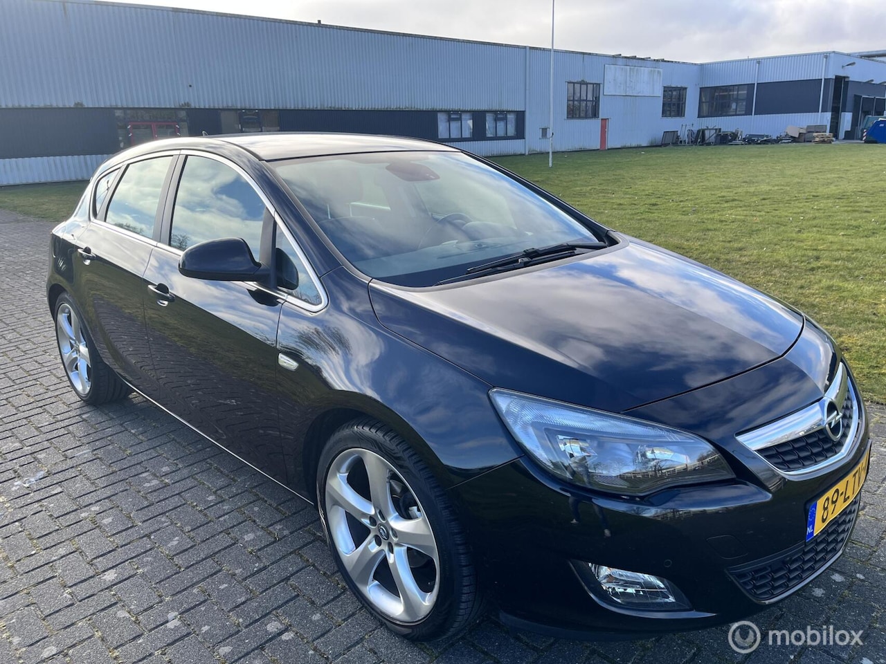 Opel Astra - 1.4 Turbo Edition / Leder / Airco / Cruise / Navi / NAP / APK / Trekhaak / - AutoWereld.nl