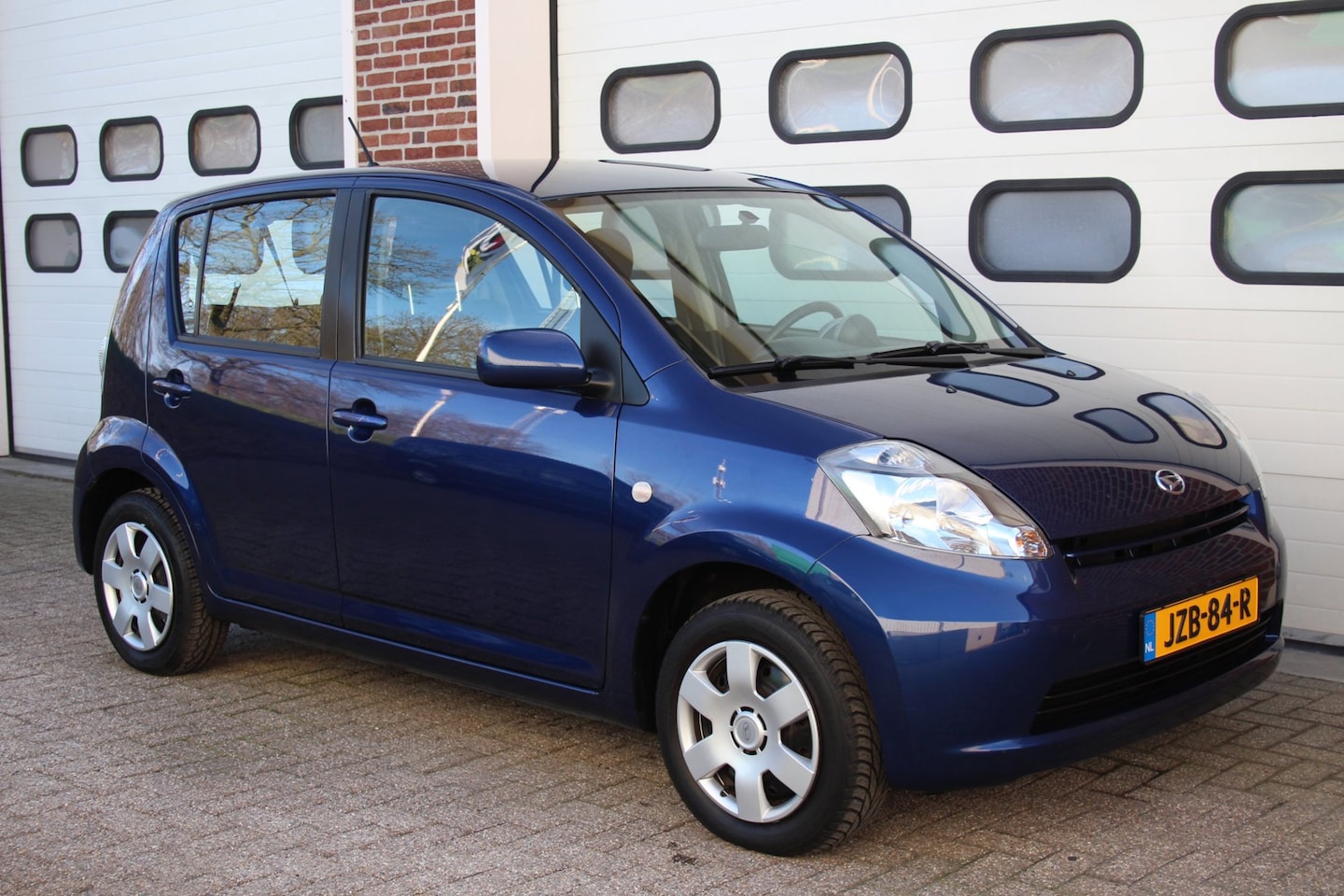 Daihatsu Sirion 2 - 1.3-16V Comfort 5-Deurs * Automaat / Airco / 64.907Km * - AutoWereld.nl