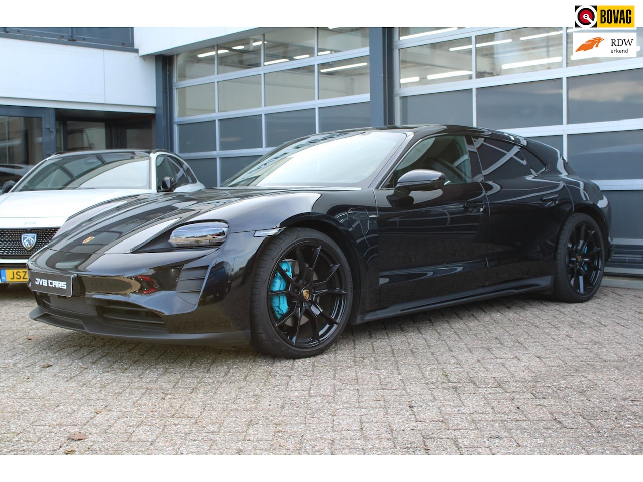 Porsche Taycan Sport Turismo - Pano/Passagier display/Luchtvering - AutoWereld.nl