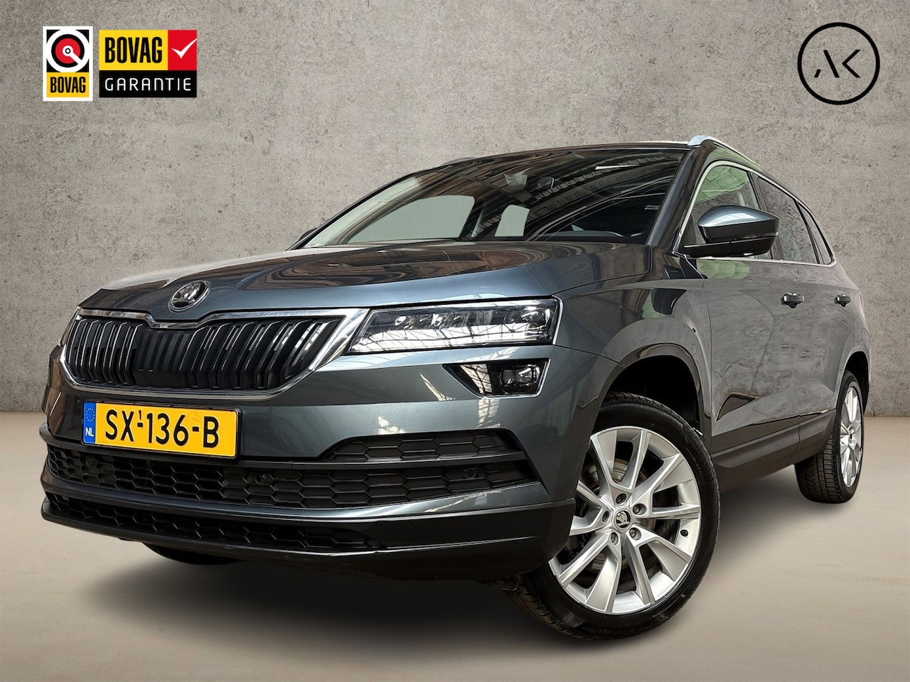 Skoda Karoq - 1.0 TSI Sport Automaat (PANORAMADAK, APPLE CARPLAY, GROOT NAVI, CLIMATE, CAMERA, STOELVERW - AutoWereld.nl