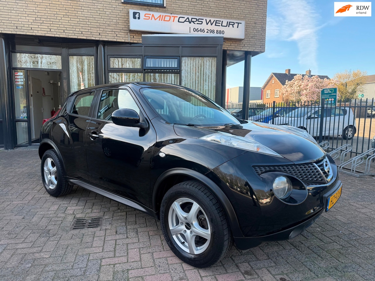 Nissan Juke - 1.6 Acenta Climate Navi Cruise - AutoWereld.nl