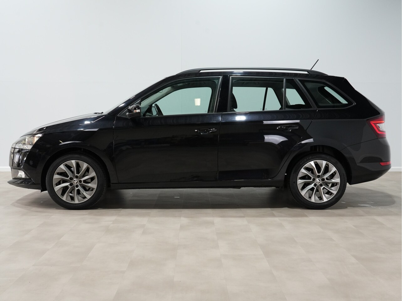 Skoda Fabia Combi - 1.0 TSI Business Edition Navi via App Pdc Cruise Lm Velgen DAB Android/Carplay 195 - AutoWereld.nl