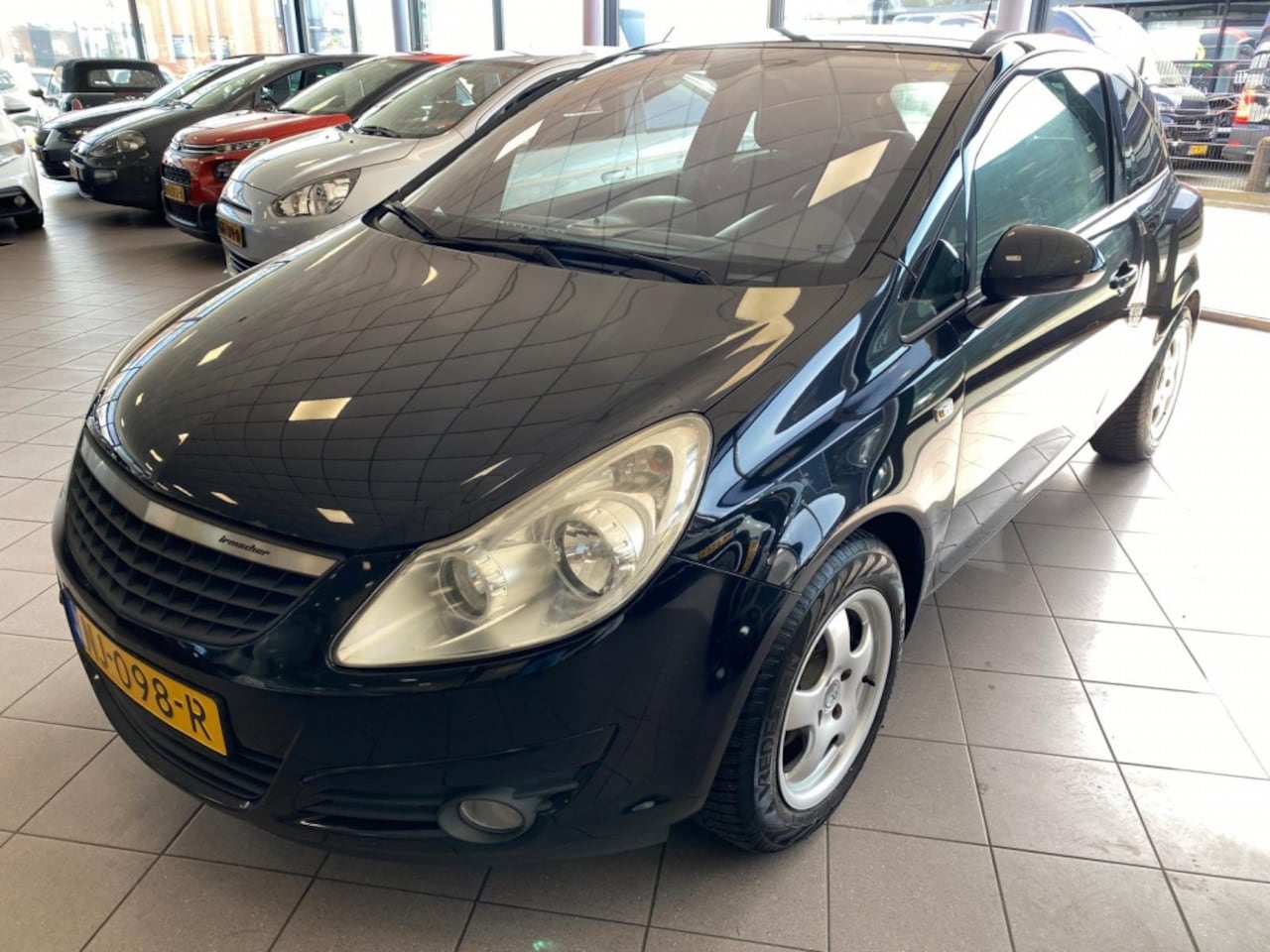 Opel Corsa - 1.4-16V Edition NAVI APK 07-26 BJ 2009 !!! - AutoWereld.nl