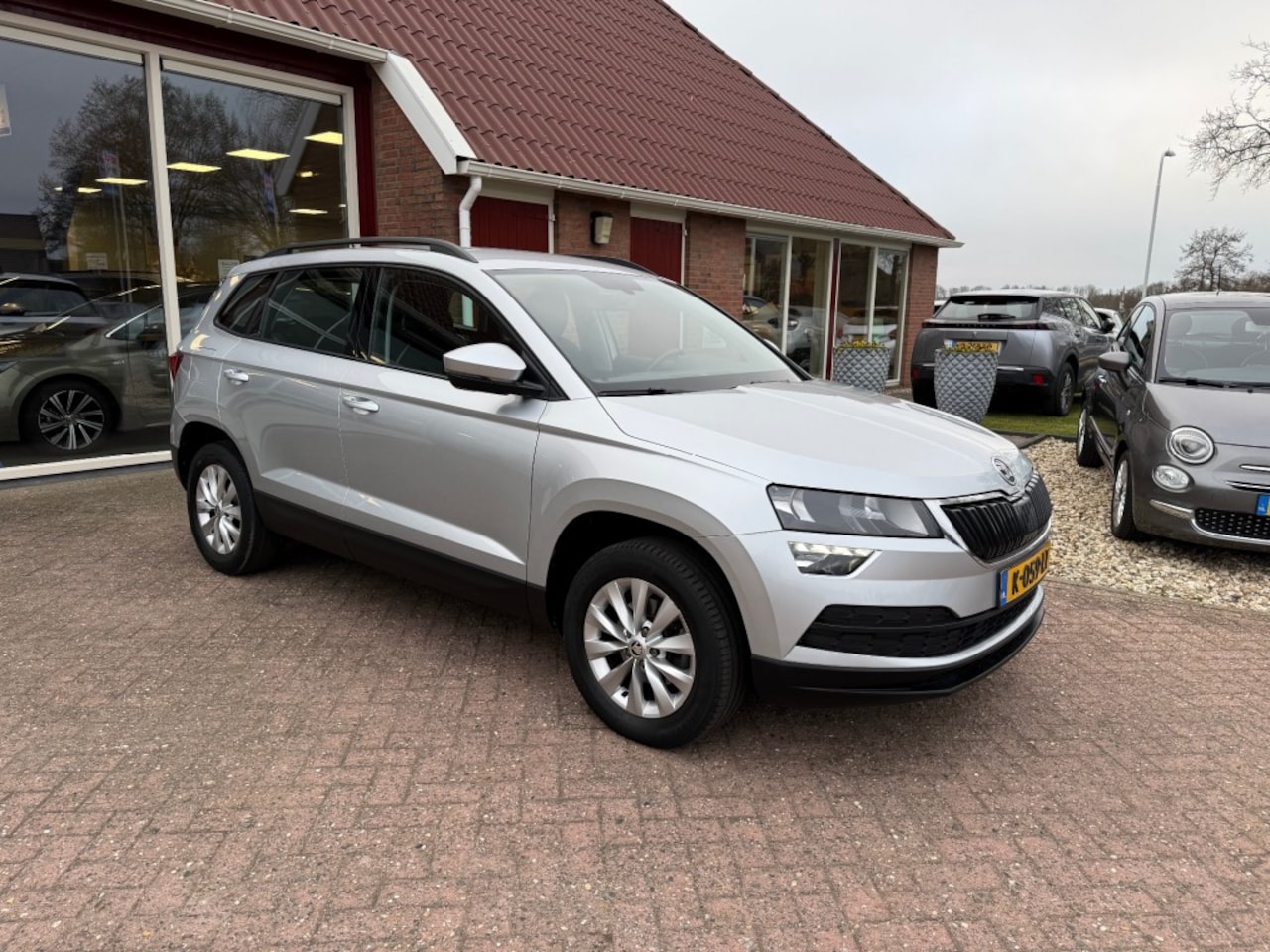Skoda Karoq - 1.0 TSI AMBITION NAVI/AIRCO/CRUISE CONTROL - AutoWereld.nl