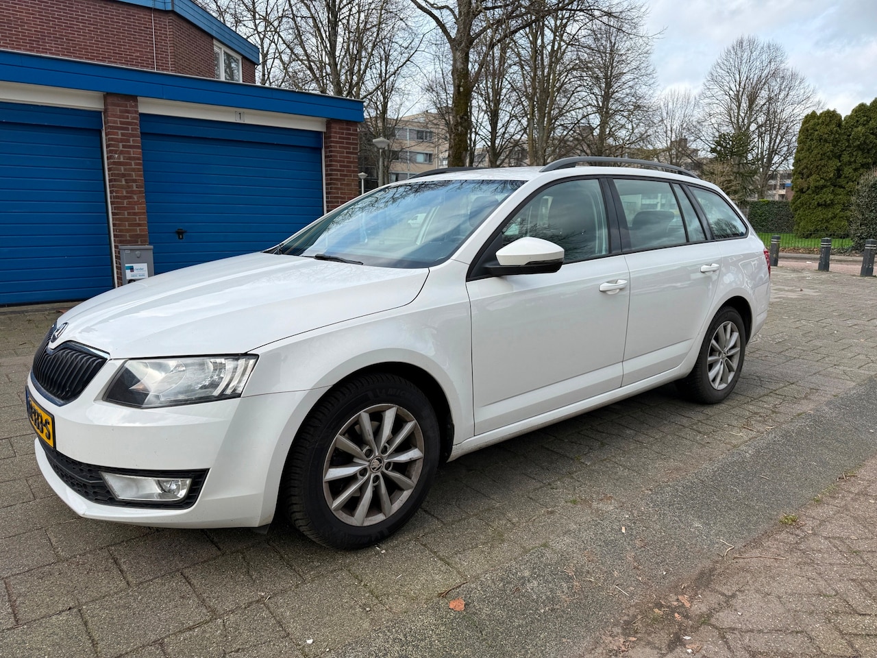 Skoda Octavia Combi - 1.6 TDI Automaat Businessline Cruise Snow White - AutoWereld.nl