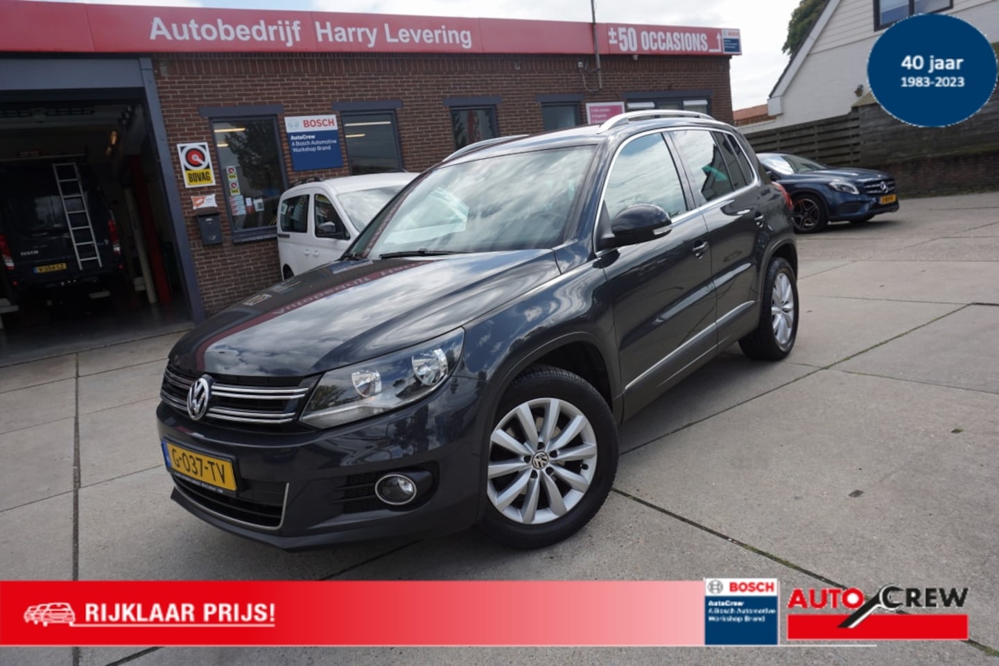 Volkswagen Tiguan - 1.4 TSI 160pk BMT Sport & Style Afn.Trekhaak - AutoWereld.nl
