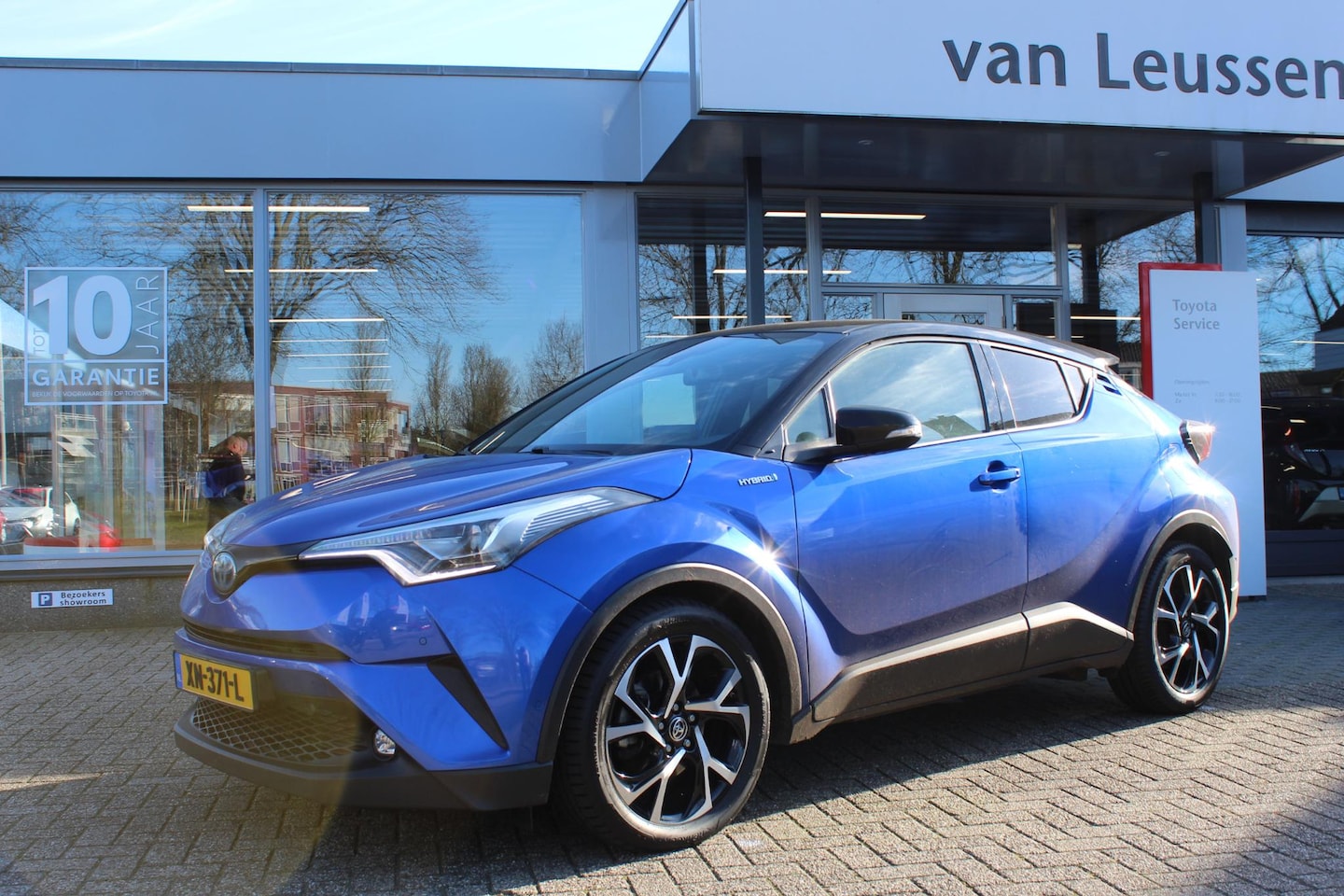 Toyota C-HR - 1.8 HYBRID BI-TONE JBL STOEL-STUUR VERW. DODEHOEK DETECTIE PARK.SENSOREN NAVI KEYLESS AD-C - AutoWereld.nl