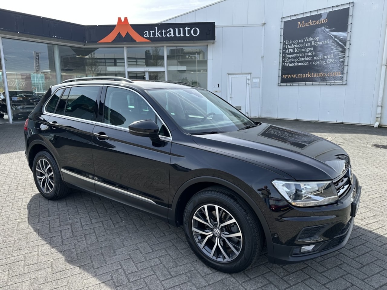 Volkswagen Tiguan - 1.4 ACT Comfortline Navi Trekhaak Camera - AutoWereld.nl