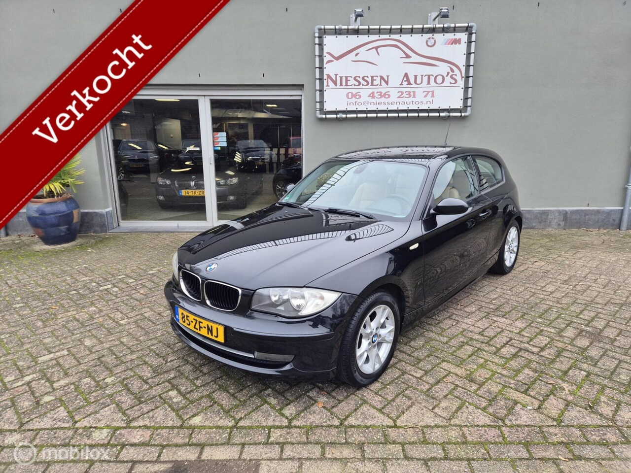 BMW 1-serie - 116i Executive Leder/Navi/Trekhaak Ketting V.V - AutoWereld.nl