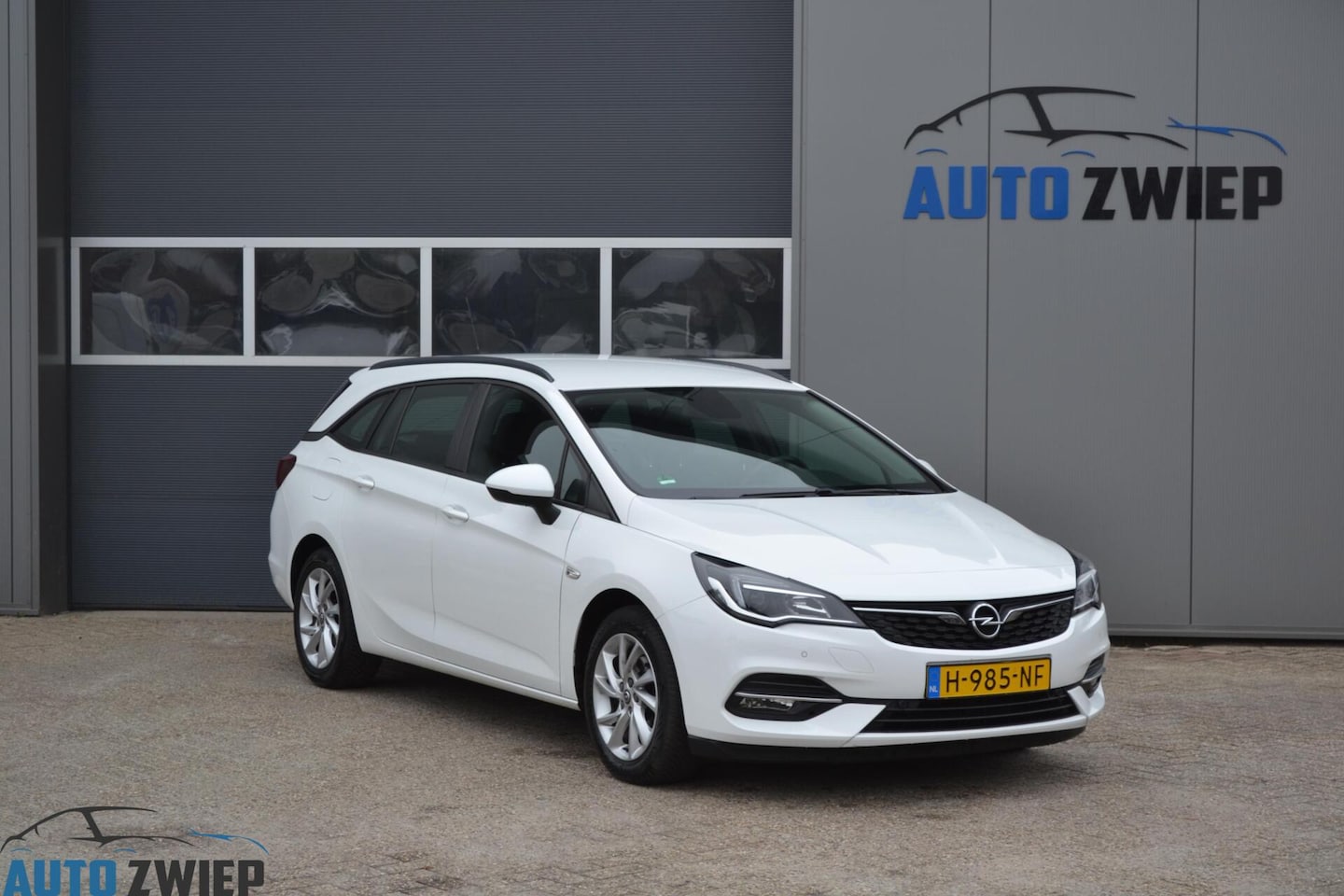 Opel Astra Sports Tourer - 1.2 Edition Navi/Cruise/camera - AutoWereld.nl