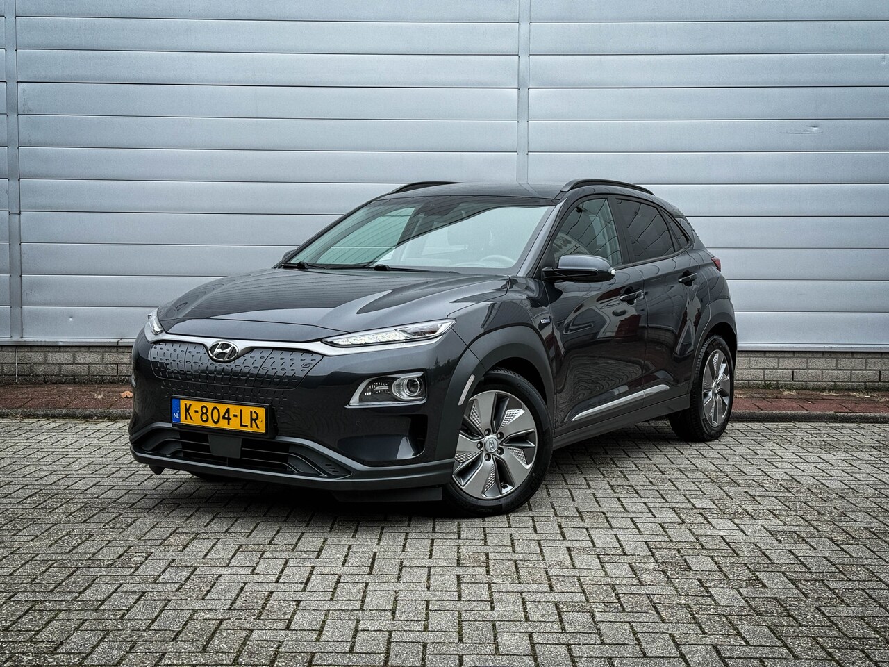 Hyundai Kona Electric - EV Premium 64 kWh | Clima | Cruise | Navi | Led | Leer | Stoel/stuur verwarming | Pdc | Ca - AutoWereld.nl