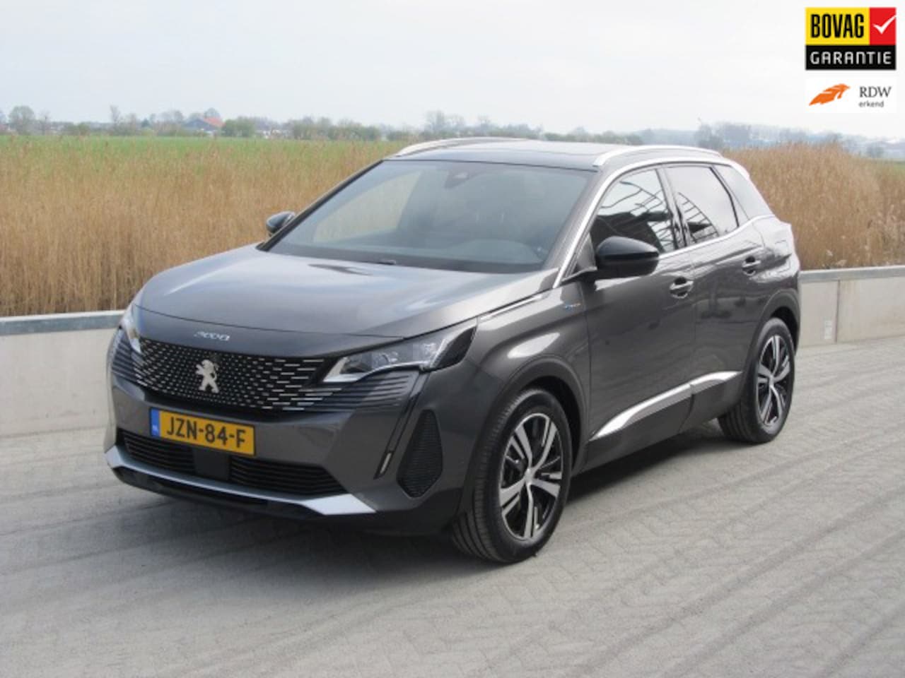 Peugeot 3008 - 1.6 HYbrid4 300 GT/Panorama/360° camera - AutoWereld.nl