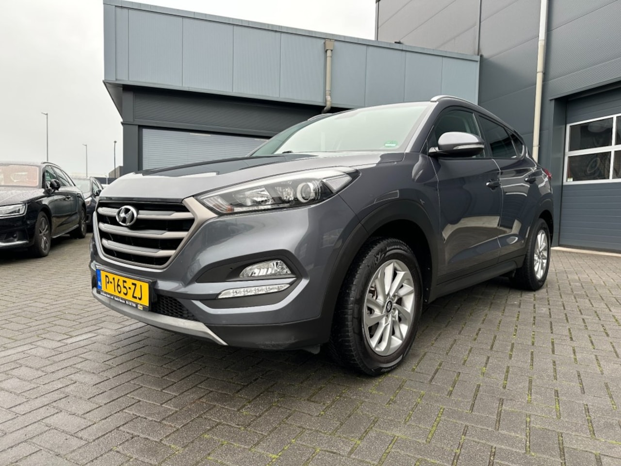 Hyundai Tucson - 1.6 GDi Comfort Navi. Camera Trekhaak - AutoWereld.nl