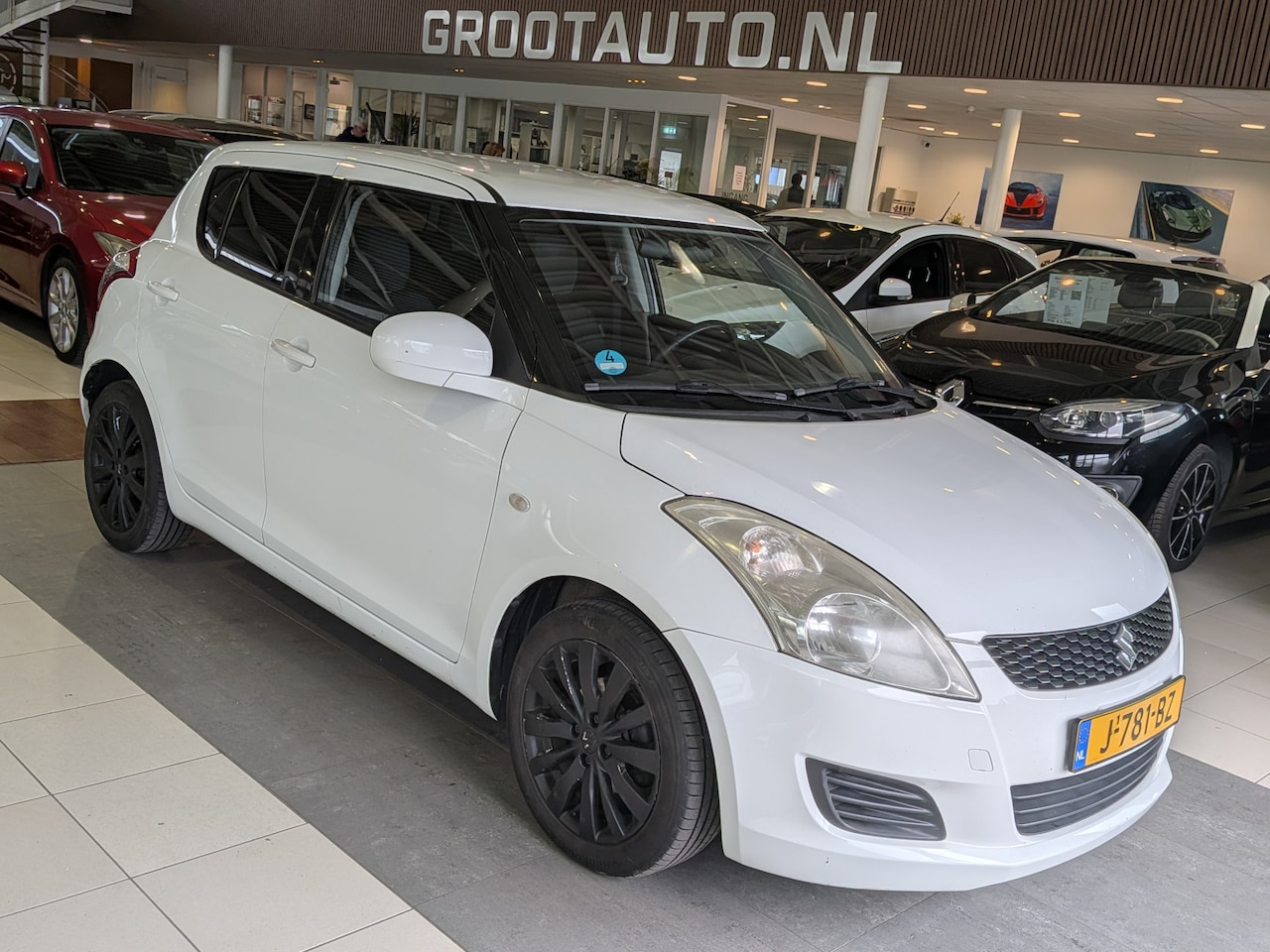Suzuki Swift - 1.2 Exclusive EASSS Airco, Stuurbekrachtiging - AutoWereld.nl