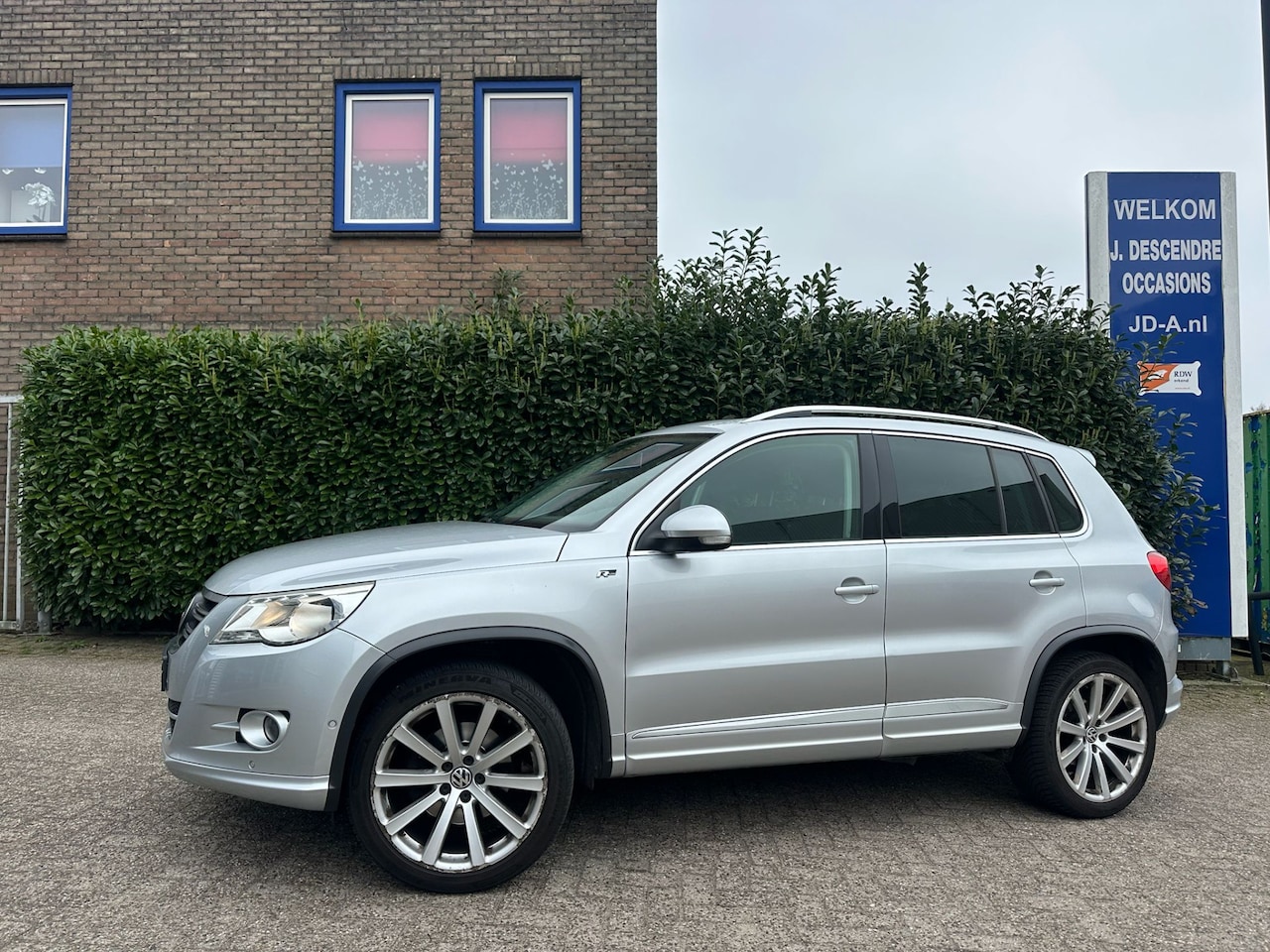 Volkswagen Tiguan - 1.4 TSI Sport&Style R-Line Climate C, Cruise C, Navigatie, Trekhaak!!!! - AutoWereld.nl