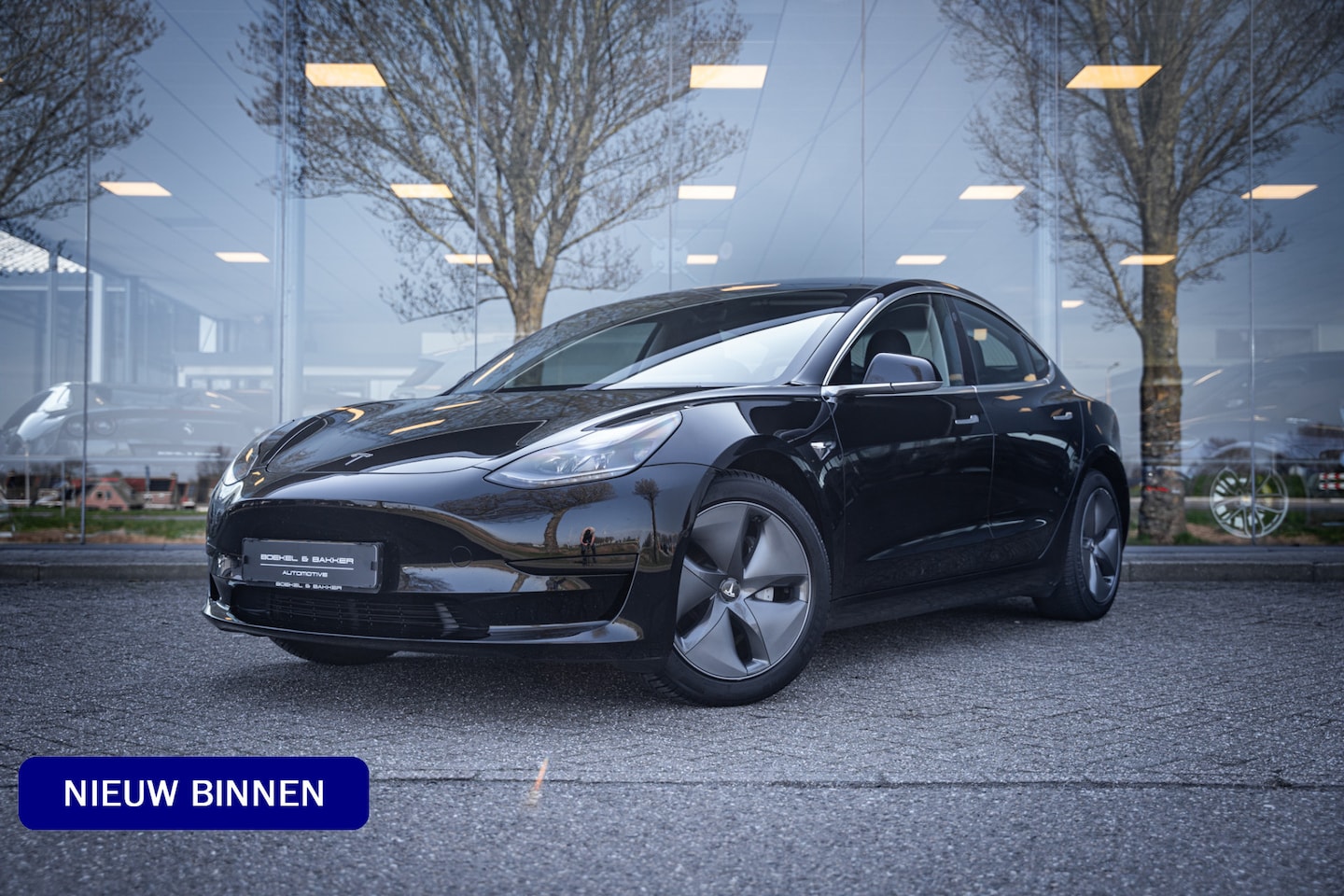 Tesla Model 3 - Standard RWD Plus 60 kWh ** Autopilot ** Trekhaak - AutoWereld.nl