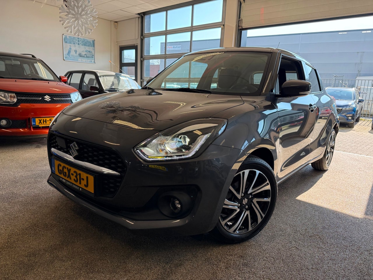 Suzuki Swift - 1.2 Stijl Smart Hybrid | Navi | Carplay - AutoWereld.nl