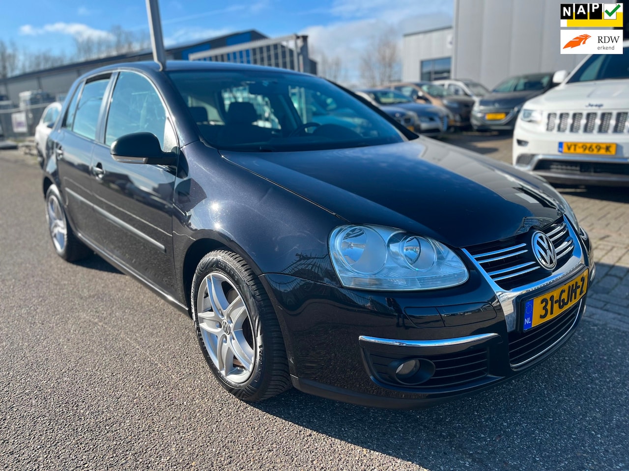 Volkswagen Golf - 1.4 TSI Trendline / Automaat / Airco / PDC l Scherm - AutoWereld.nl