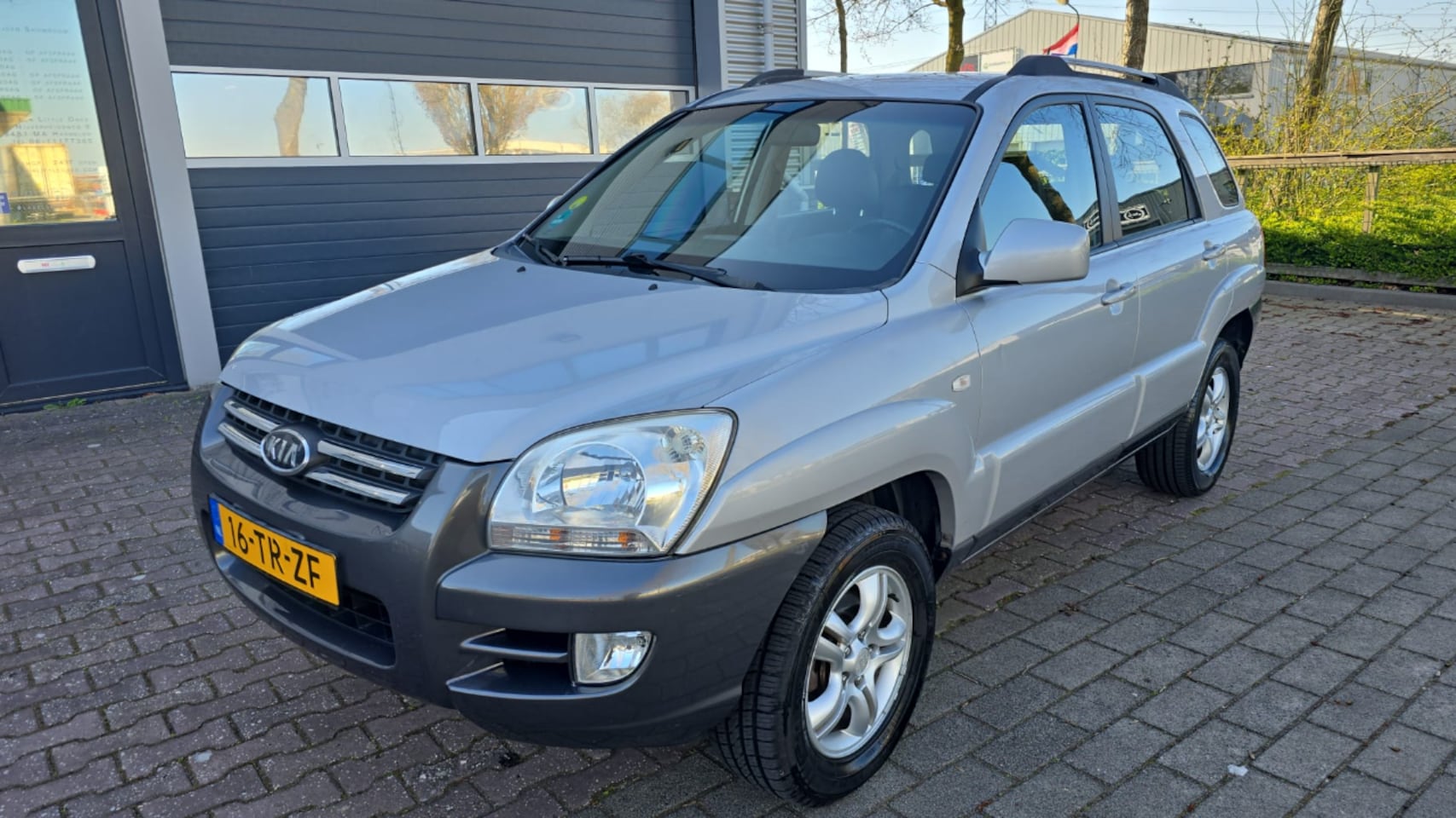 Kia Sportage - 2.0 CVVT X-ecutive 2.0 CVVT X-Ecutive - AutoWereld.nl