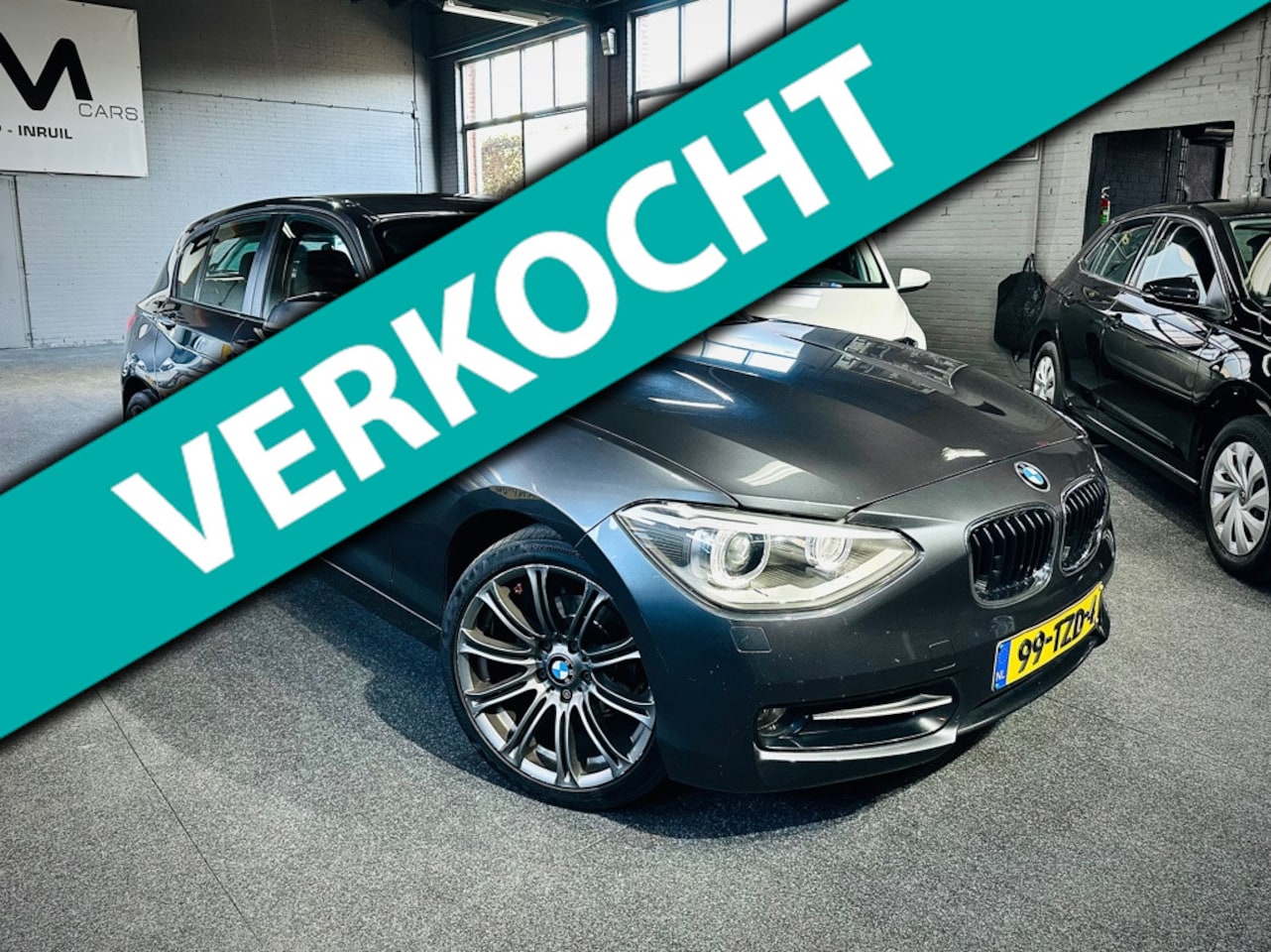 BMW 1-serie - 116i Business+ Automaat - Cruise - Navi - Climate - PDC - NAP - AutoWereld.nl