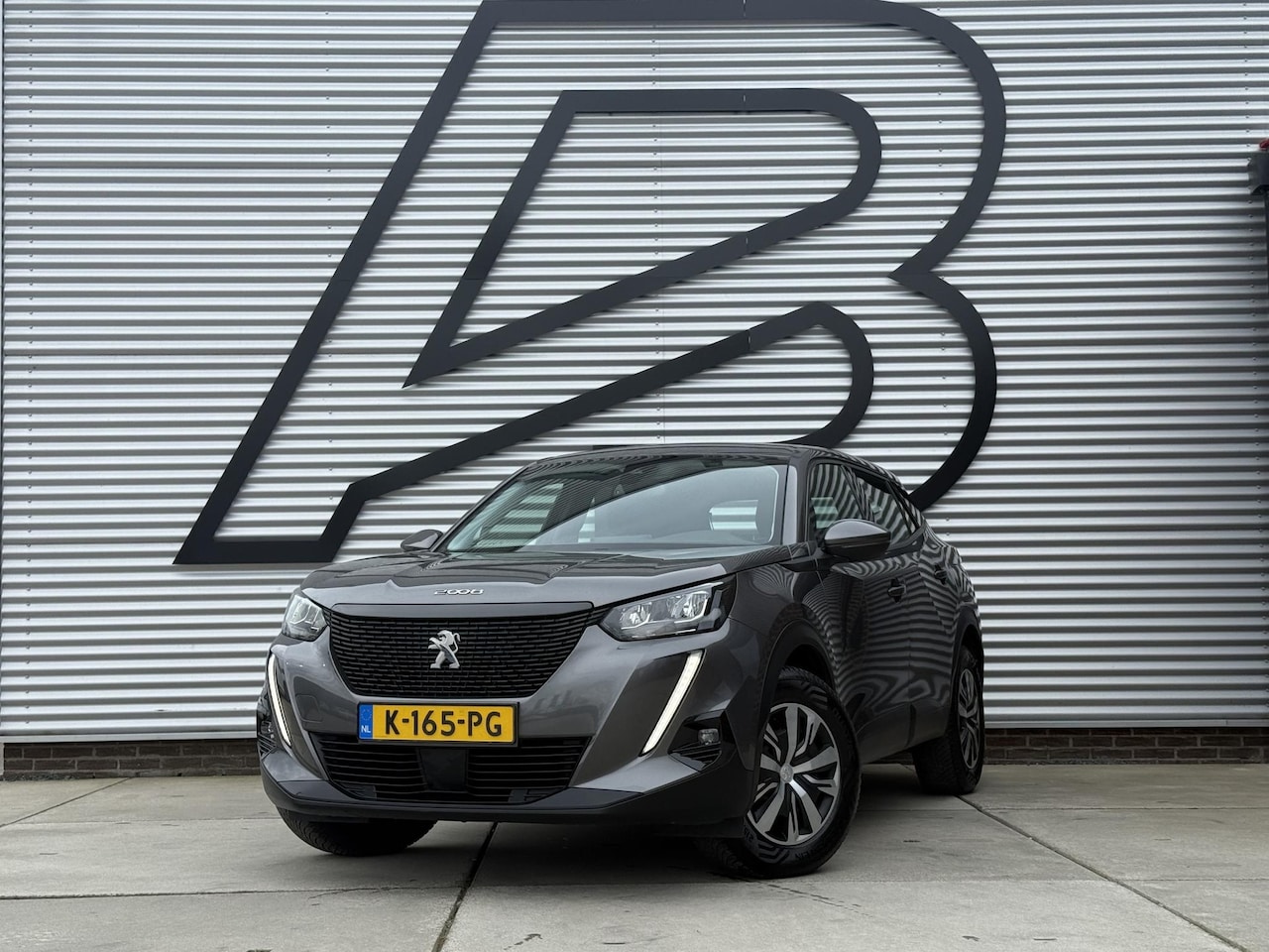 Peugeot 2008 - 1.2 PureTech Blue Lease Active 1e Eigenaar|Navi|Trekhaak|Carplay|Clima|Cruise|PDC|Dealer O - AutoWereld.nl