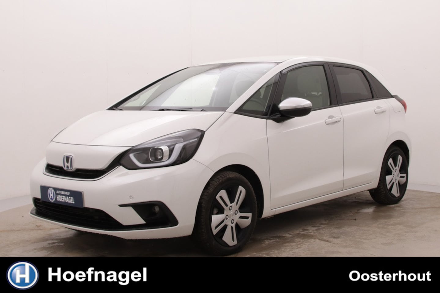 Honda Jazz - 1.5 e:HEV Elegance | Automaat | Adaptive cruise | Stuur & stoelverwarming | CarPlay | Came - AutoWereld.nl