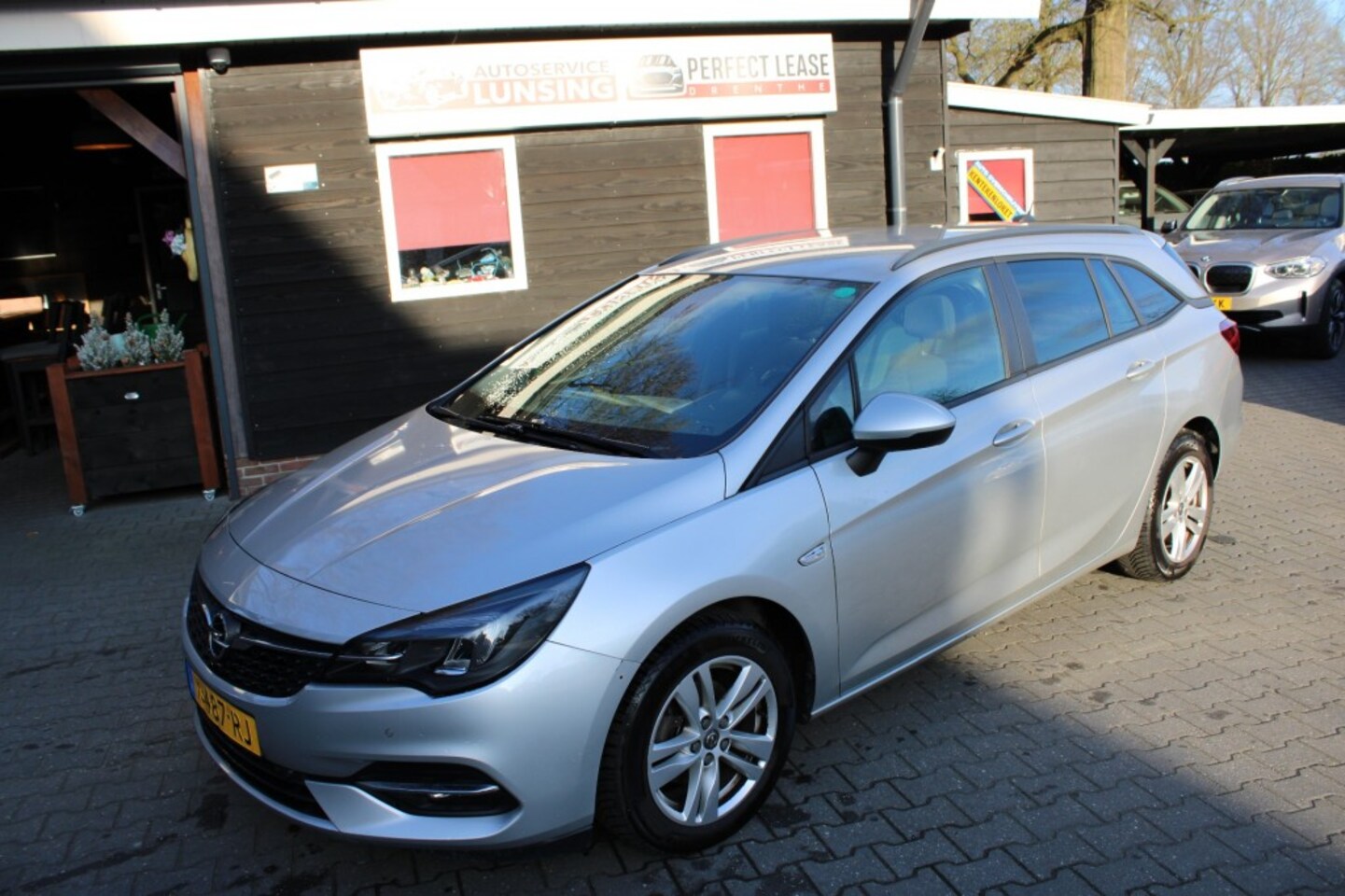 Opel Astra Sports Tourer - Sports Tourer 1.2 Business Edition - Carplay stuur en stoelverwarming - AutoWereld.nl