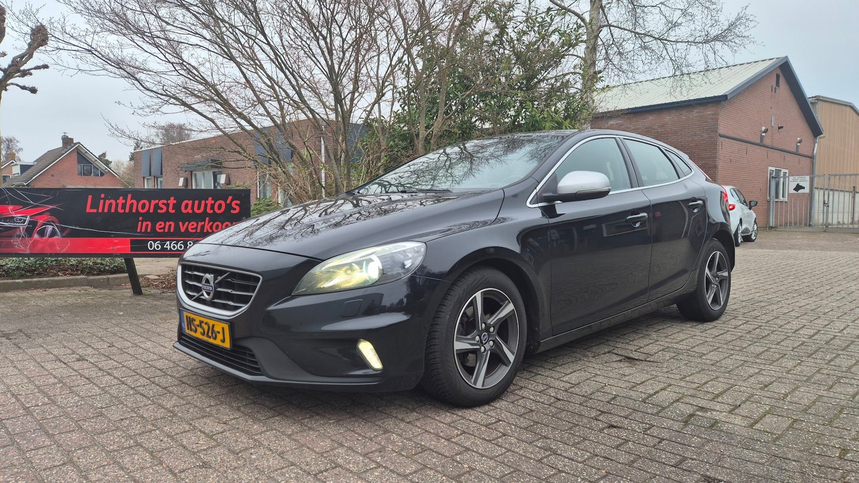Volvo V40 - 2.0 D2 R-Design Business-clima-navi-12-2015 - AutoWereld.nl
