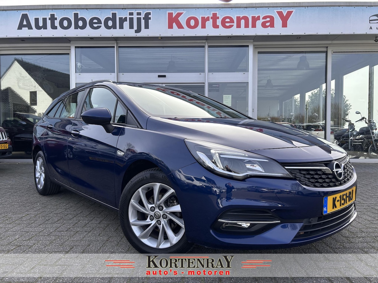 Opel Astra Sports Tourer - 1.2 Edition achteruitrij camera/airco/navi/cruise control/carplay/pdc - AutoWereld.nl