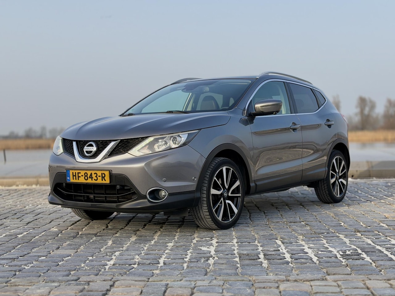 Nissan Qashqai - 1.2 Tekna|Pano|Trekhaak|Stoelverwarming|360cam - AutoWereld.nl