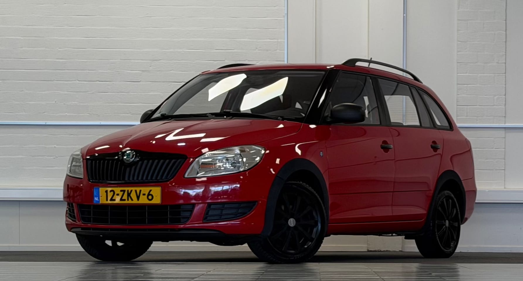 Skoda Fabia Combi - 1.2 TSI Arctic 2e Eigenaar 100% Onderhouden LM velgen Airco Garantie Mooi! - AutoWereld.nl