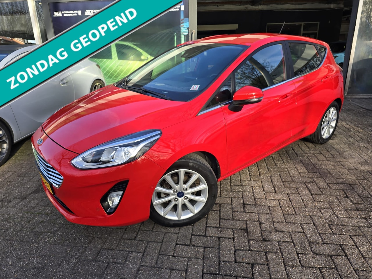 Ford Fiesta - 1.0 EcoBoost Titanium | 2E EIGENAAR | 12 MND GARANTIE | NAVI | CRUISE | NL AUTO | - AutoWereld.nl