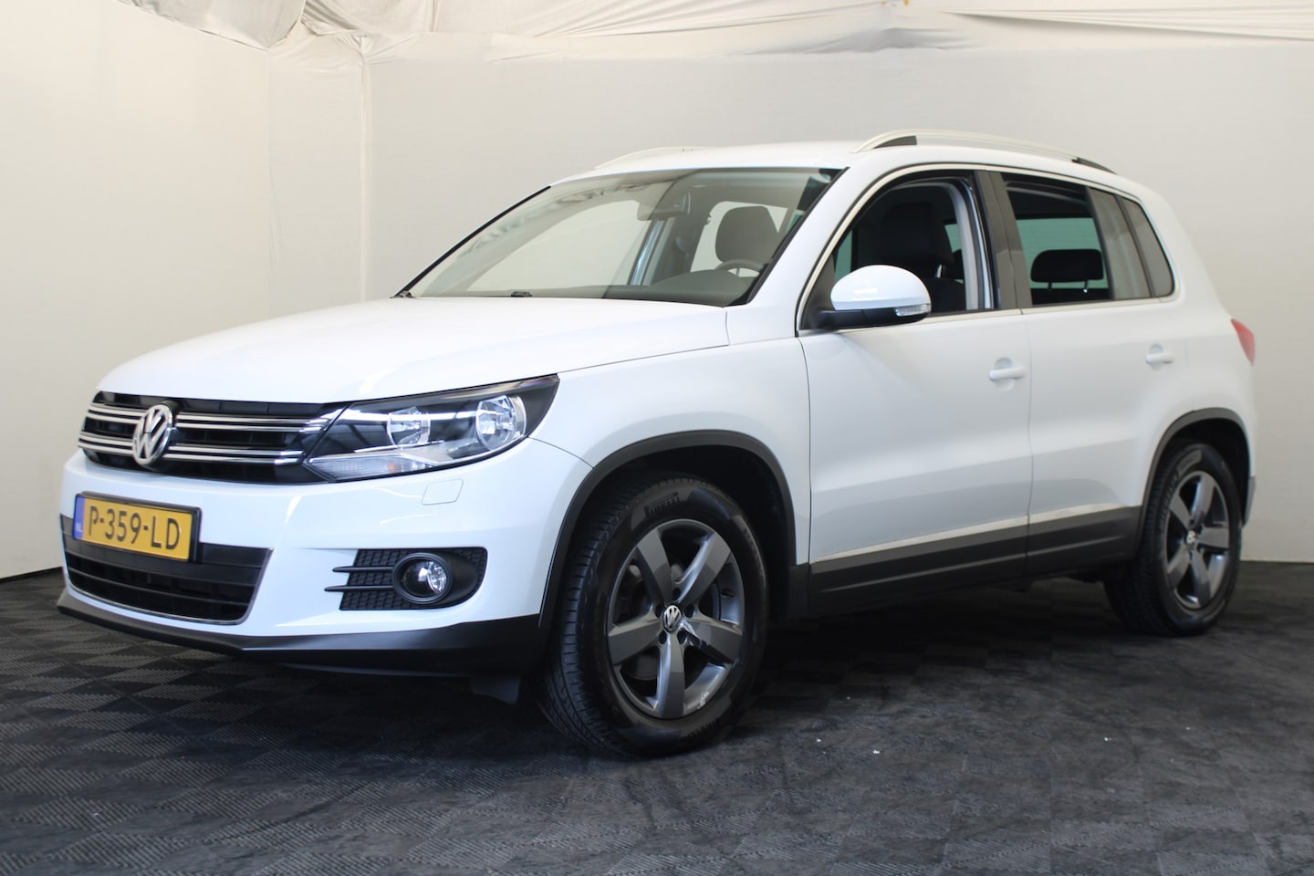 Volkswagen Tiguan - 1.4 TSI Sport&Style - AutoWereld.nl