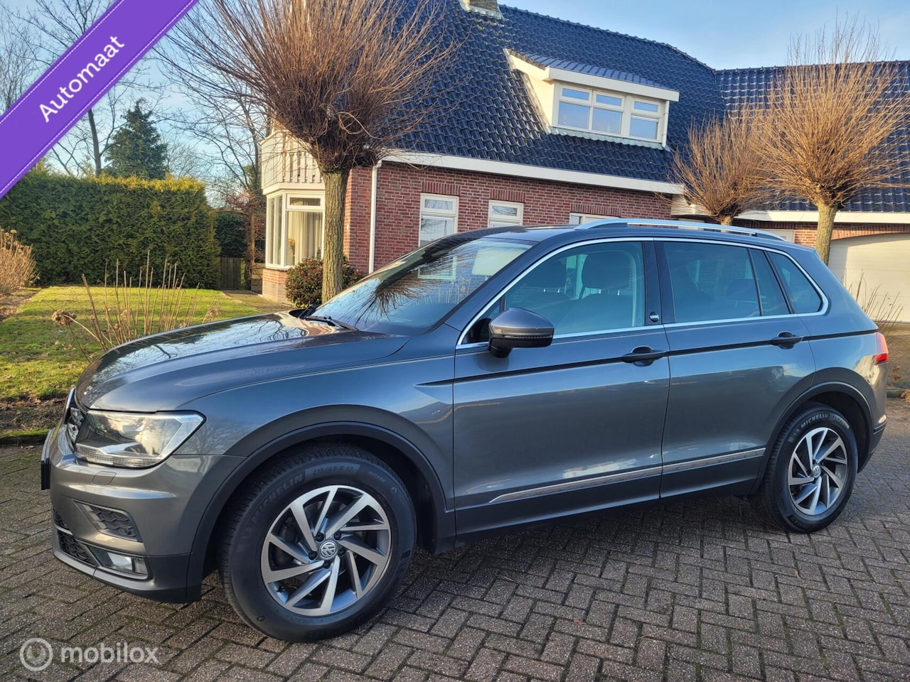 Volkswagen Tiguan - 1.4 TSI ACT Highlne,autom,panoramadak,navi - AutoWereld.nl