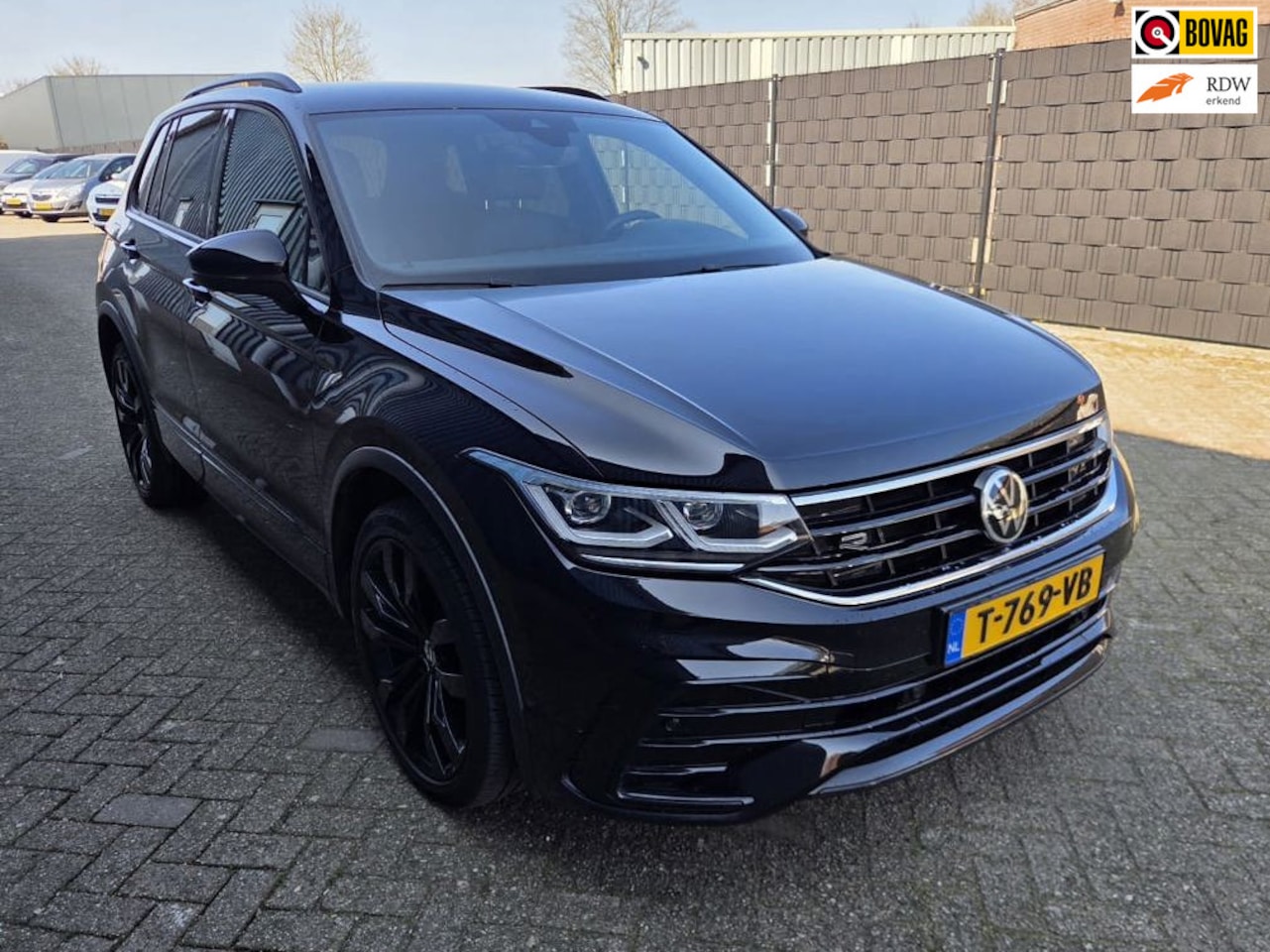 Volkswagen Tiguan - 1.4 TSI eHybrid R-Line Business+ / Trekhaak / Leer /..... - AutoWereld.nl