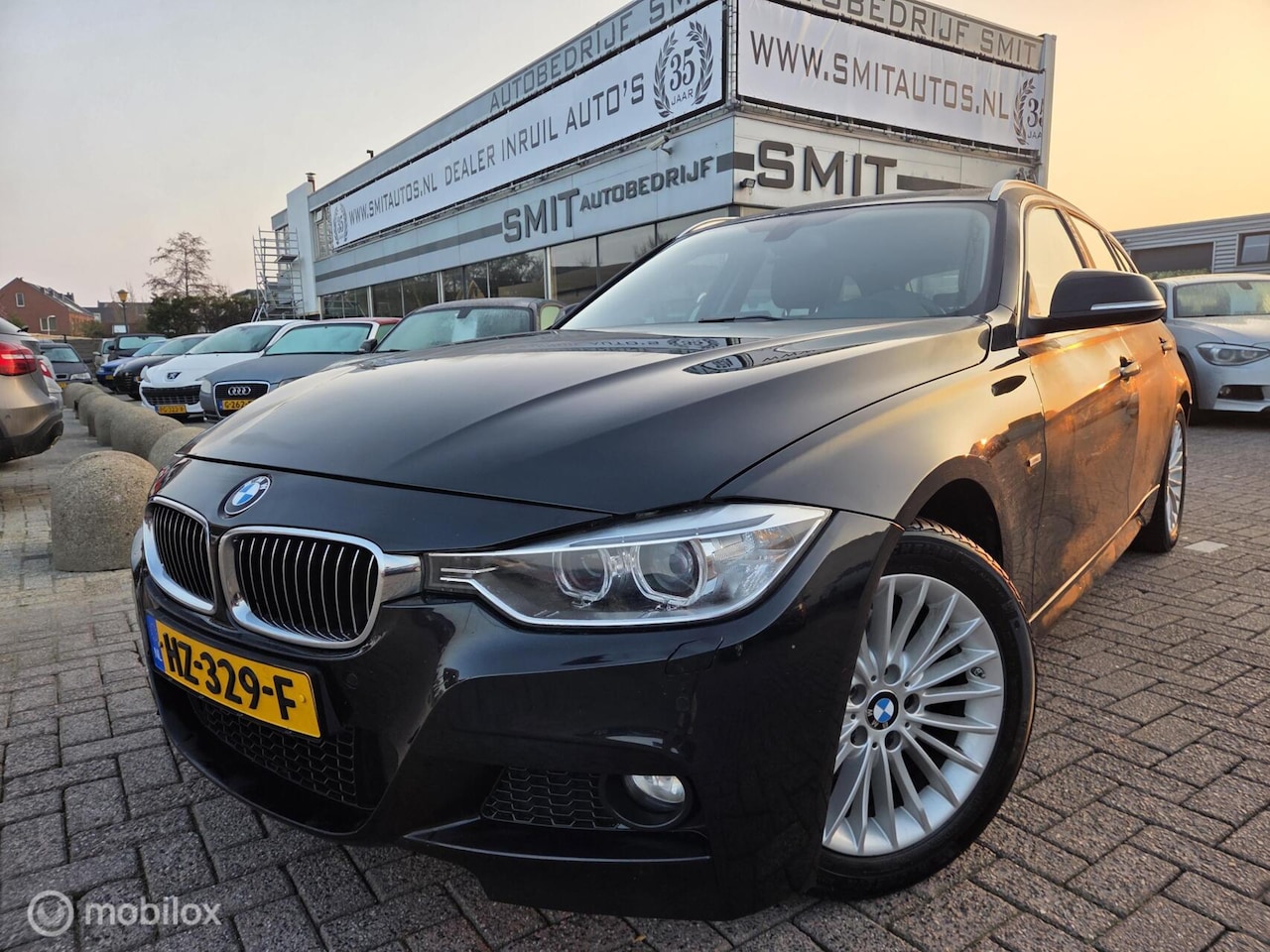 BMW 3-serie Touring - 320d High Ex. Luxury Aut/Nav/PDC/CC/Xen - AutoWereld.nl