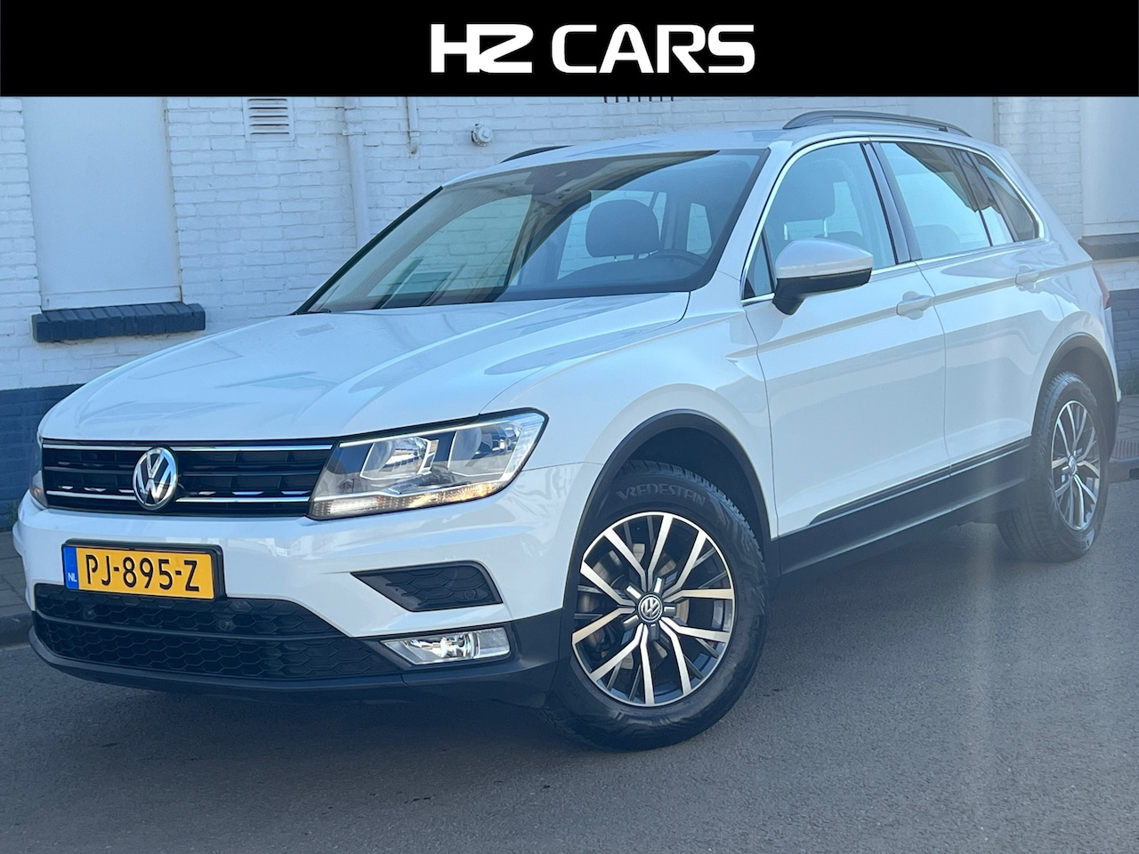 Volkswagen Tiguan - 1.4 TSI ACT Comfortline/Automaat/Trekhaak/Cruise/Airco/LaneAssist/PDC - AutoWereld.nl