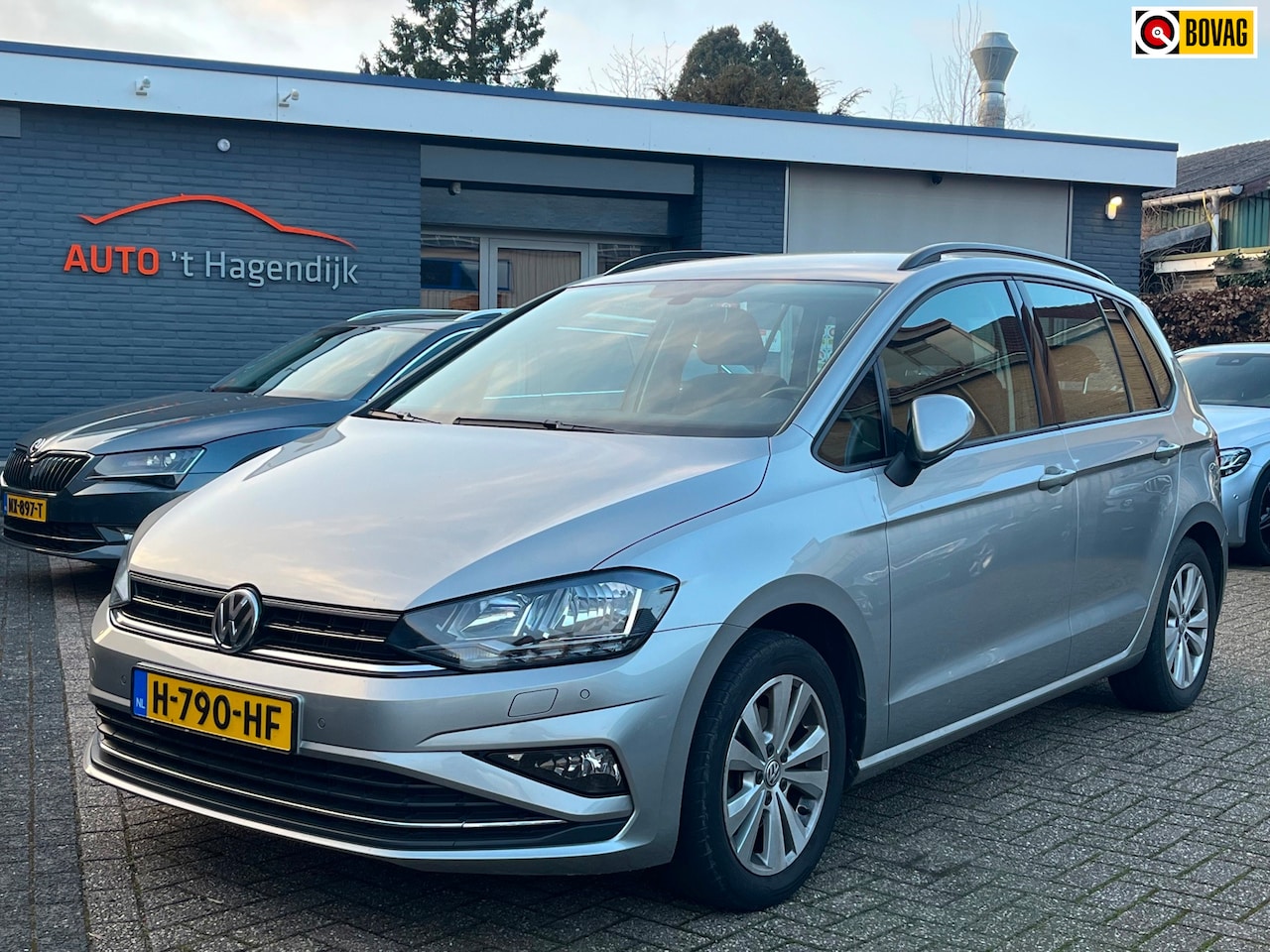 Volkswagen Golf Sportsvan - 1.5 TSI ACT AUT trekh navi clima - AutoWereld.nl